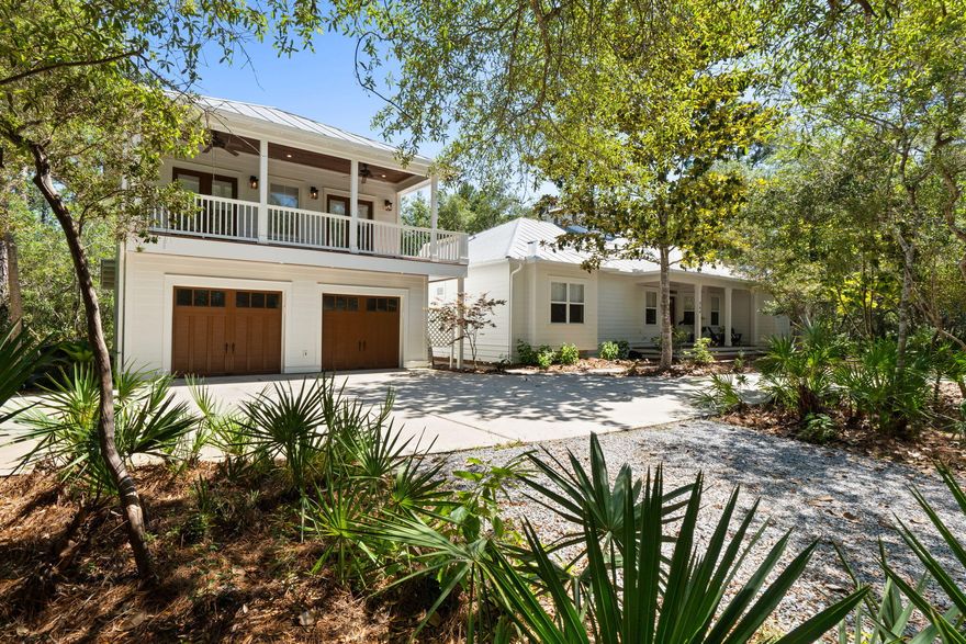 Tucked away on a secluded, wooded .7-acre homesite in the highly sought-after Bay Magnolia community of Point Washington, this custom residence offers an exceptional blend of privacy, craftsmanship, and coastal luxury. Built by renowned builder Luke & Blue's, the home showcases quality construction and timeless finishes throughout, including beautiful Brazilian hardwood flooring and a chef-inspired kitchen appointed with high-quality appliances (like ILVE range).
Thoughtfully enhanced with over $150,000 in upgrades within the past 18 months, this property has been meticulously improved for both comfort and peace of mind. The beautifully remodeled primary bathroom creates a spa-like retreat, while major system updates include both HVAC units replaced in 2019, a new water heater installed in 2024, and a full exterior repaint completed in 2026.
Designed with flexibility in mind, the home offers 5 bedrooms, including a private carriage house that has previously generated income, ideal for guests, extended family, or added investment potential. The detached 2-car garage sits below the carriage house, providing excellent storage and functionality.
Outdoor living is equally impressive, with a covered and screened back porch overlooking the fenced backyard and inviting firepit area, perfect for quiet evenings, entertaining, or simply enjoying the peaceful natural setting. Ideally positioned adjacent to the walking path leading to the bayfront park and community pier, this home offers easy access to one of Point Washington's most cherished lifestyle amenities.
Just minutes from 30A, Grayton Beach, Seaside, dining, shopping, and world-class beaches, this rare Bay Magnolia offering delivers the space, seclusion, quality, and location that make Point Washington so desirable.