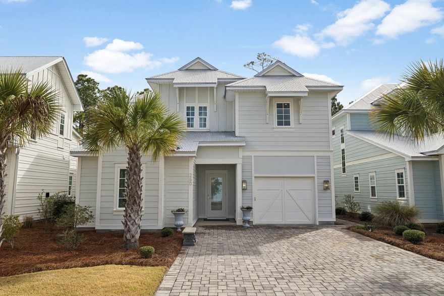 Located on a quiet cul-de-sac within a peaceful community surrounded by the natural beauty of Point Washington State Forest, this 4-bedroom, 3.5-bath home built by one of 30A's premier builders, BC Luxury Homes, offers a rare combination of privacy, nature, and convenience just minutes from the beaches of 30A. Residents enjoy a neighborhood clubhouse, pool, and pond, along with nearby walking and biking trails through the forest. Multiple public beach accesses, restaurants, shopping, and Sacred Heart Hospital are all just a short drive away.

A long cobblestone paver driveway welcomes you to the home, where a bright and open interior is filled with natural light and calming forest views. The main living area flows seamlessly into the kitchen, creating a comfortable and inviting space for both everyday living and entertaining.

The kitchen features quartz countertops, stainless steel appliances, and a large center island with abundant storage. A thoughtfully designed pantry includes a coffee bar and additional appliance storage for added convenience.

The floor plan offers flexibility and comfort, including a first-floor ensuite bedroom ideal for guests. Upstairs, the primary suite features elegant tray ceilings, a spacious walk-in closet, and a vaulted bath complete with a soaking tub, water closet, and an impressive seven-foot tiled shower.

Two of the upstairs bedrooms share access to a private balcony overlooking the preserve,  a peaceful spot to enjoy sunrise views and watch local wildlife.

Additional highlights include a garage with built-in storage and workspace, as well as a well-designed laundry room with cabinetry, counter space, hanging area, and over-door storage.

A durable metal roof and easy-maintenance landscaping further enhance the home's long-term convenience and appeal.

This is a rare opportunity to enjoy bright, comfortable coastal living in a quiet neighborhood surrounded by nature - yet just minutes from the beach.

No short-term rentals permitted.