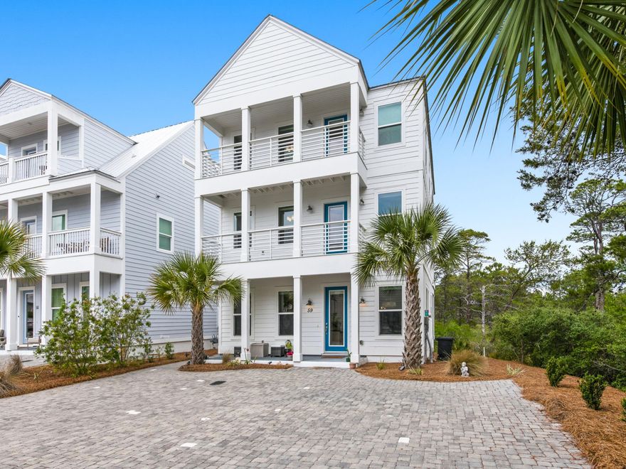 Set on a premium homesite in the northeast corner of Serenity at Dune Allen, this beautifully maintained three-story residence offers a rare sense of privacy along 30A's west end. Green space borders the home to the north and east, creating a quiet natural backdrop that distinguishes the property from others in the community while placing the beach within easy walking distance.

Never rented and presented in like-new condition, this four-bedroom, four-and-a-half-bath home is designed with comfort, flexibility and effortless coastal living in mind. Extended parking provides a valuable advantage for owners and guests, while the versatile layout supports use as a primary residence, second home or future rental investment. The main living level is bright and inviting, with raised ceilings, abundant natural light and an open-concept design that connects the kitchen, dining and gathering spaces with ease. Modern finishes lend a polished coastal feel, while multiple porches across all three levels invite quiet mornings, afternoon breezes and relaxed evenings outdoors.

All four bedrooms feature ensuite baths and private porch access, offering a thoughtful level of comfort for family and guests. The second and third levels each include two spacious bedroom suites along with flex nooks suited for a home office, reading area or secondary lounge space. A screened rear patio expands the outdoor living experience, providing another shaded place to enjoy the home's peaceful setting.

With a community pool, beach access nearby and one of the more desirable homesites in Serenity at Dune Allen, this turnkey retreat pairs convenience with privacy in a location made for the 30A lifestyle.