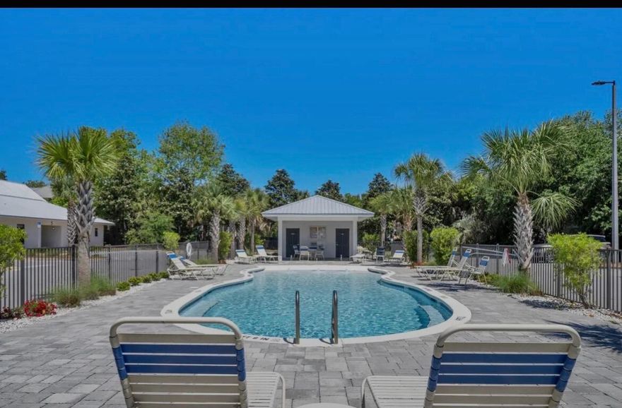 Location! Location! This incredible 2 BR 2 BA Hidden Lake Condominium ground floor, end unit is in a prime location on the West end of Scenic 30-A. Hidden Lake features a modern 'Zero Entry' pool, Fitness Center; BBQ grills  and plenty of overflow parking.  Complex has WiFi internet included, and pets are allowed with restrictions. Interior boasts 9' ceilings, LVP flooring, granite counter tops throughout; stainless appliances; washer & dryer; Walk or bike to all of the amenities of nearby 30A Shopping and Restaurants. This one won't last long, so come see it today!  Tenant to verify all information.