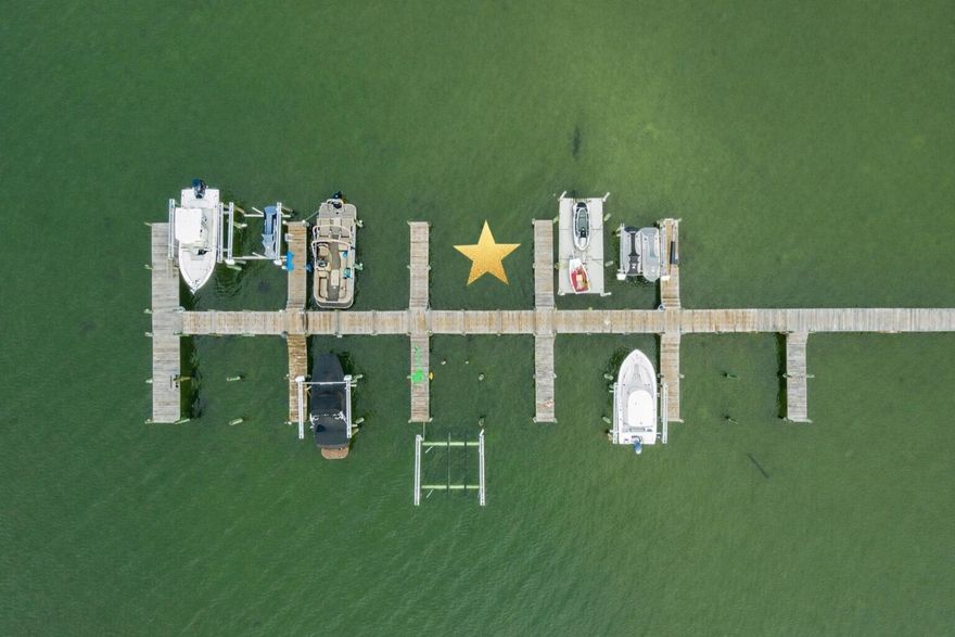 Welcome to the desirable gated community of Palmetto Preserve--home to one of the last remaining waterfront lots in Navarre.

This exceptional property offers pristine water clarity, deeded beach access, and a private boat slip--a rare privilege, as not every home in the community has one. Build your dream home and enjoy immediate access to the water from day one.

Located in East Navarre, Palmetto Lake Preserve is conveniently close to top-rated schools, shopping, and Hurlburt Field Air Force Base, while still offering privacy and tranquility. The low HOA of just $115/month truly delivers value, covering a beautiful gated entrance, underground utilities, well-lit paved roads, a community dock, and meticulously maintained beach access. The lot features approximately 165 feet of total water frontage and spans .39 acres, providing ample space for a luxury custom home. A Geo-Con soil study has already been completed, allowing your builder to review and move forward without delay. In addition, the seller is providing a survey at their expense, along with a potential building floor plan that may be used or customizedvaluable tools to help bring your vision to life.

Nestled in a quiet cul-de-sac, the community is thoughtfully designed with a Y-shaped entrance leading to two cul-de-sacs, creating minimal traffic and a peaceful setting. With only two neighboring waterfront homes, you'll enjoy exceptional privacy.

Spend your days dolphin watching, boating, kayaking, fishing, and soaking up the Florida sunjust minutes from Navarre Beach.

All showings must be accompanied by a REALTOR® due to gated access.

This is truly one of the finest buildable waterfront lots remaining in Navarrea rare opportunity to secure luxury, lifestyle, and long-term value.