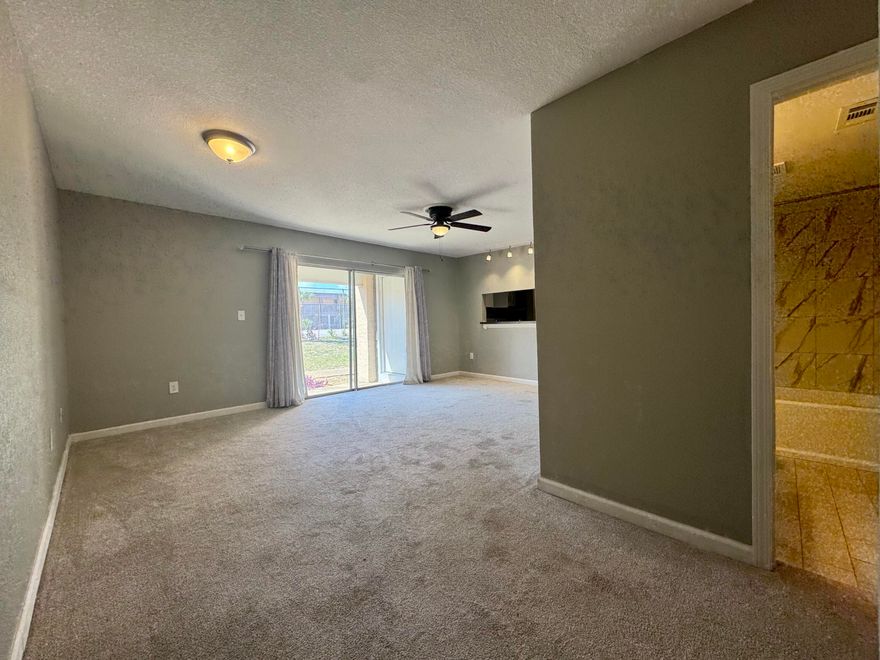 Welcome to this updated first-floor condo offering comfort, convenience, and an unbeatable location. Ideally situated just minutes from major military bases, shopping, dining, and the stunning emerald waters of the Gulf Coast, this property is perfect as a primary residence, second home, or investment opportunity.

Step inside to an inviting living area filled with natural light, thanks to large west-facing sliding glass doors that create a bright and welcoming atmosphere. The open-concept layout features a seamless connection between the kitchen and living space--perfect for both everyday living and entertaining--while still maintaining a sense of defined space.

Recent updates include upgraded wiring, and the unit is equipped with washer and dryer hookups for added convenience. Plush carpeting throughout enhances the cozy feel, creating a comfortable retreat to relax and unwind.

The condo offers two generously sized bedrooms, providing ample space for family, guests, or a home office setup.

Whether you're looking for a low-maintenance lifestyle near the beach or a smart addition to your portfolio, this well-located condo is a fantastic opportunity.

Please note: This property is being sold as part of a bankruptcy proceeding and is subject to court approval. Buyers are encouraged to verify all details, terms, and timelines associated with the sale.