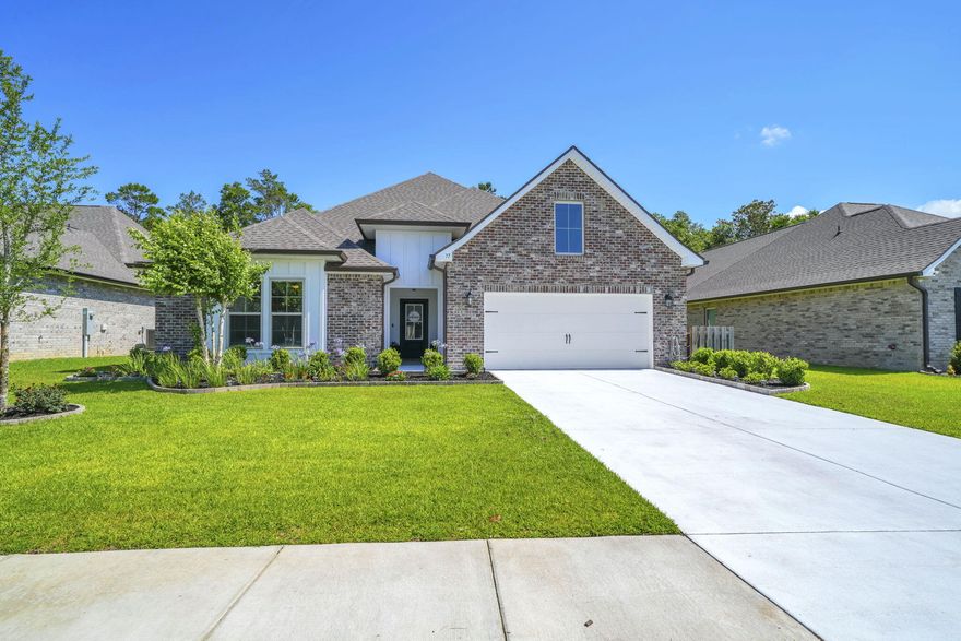 Welcome to the popular Sycamore III floor plan in the sought-after Starburst section of Hammock Bay! This meticulously maintained 4-bedroom, 2-bath home offers an open layout with thoughtful upgrades and functional spaces throughout.
The kitchen features a large island, walk-in pantry, recessed lighting, crown molding, under-mount sinks, and flows perfectly into the main living and dining areas -- ideal for entertaining or everyday living. A flex space offers room for an office, playroom, or second sitting area.
The spacious primary suite includes separate vanities, a relaxing garden tub, custom tiled shower, and walk-in closet. Bedrooms 3 and 4 also feature walk-in closets, and the secondary bath includes a double vanity.
Step outside and enjoy the screened-in lanai overlooking the beautifully maintained backyard with pavers and a peaceful natural area behind the home that will not be built on. The property also includes a well-water deionization system for the sprinkler system and an 8x12 shed with electric -- perfect for storage, hobbies, or a workshop space.
The oversized garage includes a special bump-out area plus added storage space for tools, bikes, or seasonal items. Additional exterior features include gutters around the entire home and permanent flower bed edging that adds great curb appeal to the front yard.
Additional interior features include a drop spot in the utility room, framed mirrors, flood lights, architectural 30-year shingles, smoke/carbon monoxide detectors, and energy-efficient upgrades including Low-E vinyl windows and an energy-saving appliance package.
Located in the amenity-rich Hammock Bay community with pools, fitness center, sports courts, walking trails, and more!