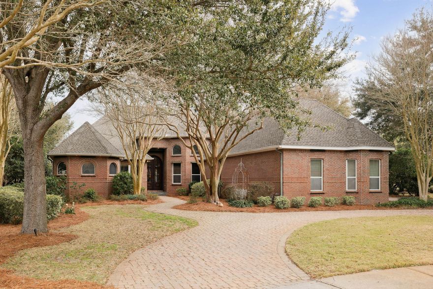 Overlooking the par-3 8th hole of Kelly Plantation with tranquil lake views beyond, 6326 Augusta Cove offers refined golf course living within one of Destin's most distinguished gated communities. Elegant domed ceilings lend volume and crafted refinement throughout. Recent improvements include a new roof, pool screening and equipment, and a tankless water heater. The screened outdoor living space is exceptional -- a zero-entry pool with water features and spa, complemented by a fully appointed summer kitchen. A three-car garage and quiet Augusta Cove setting complete a residence that transitions effortlessly between full-time luxury living and a premier coastal retreat. The interior is designed to live as beautifully as it looks -- an open, light-filled layout where generous proportions and thoughtful finishes create a sense of ease and elegance. Domed ceilings introduce subtle grandeur, while expansive windows frame sweeping fairway and lake vistas that shift with the light throughout the day.
The outdoor environment rivals the finest coastal retreats. A zero-entry pool with integrated spa and water features anchors the expansive screened enclosure, allowing year-round enjoyment in a setting that feels genuinely private. The summer kitchen creates a natural gathering space for relaxed evenings and refined entertaining.
Additional infrastructure includes a whole-home standby generator -- a meaningful feature for coastal properties and one that conveys with the home.
Kelly Plantation delivers a lifestyle that's rarely replicated -- championship golf, clubhouse dining, bay access, tennis and pickleball, a fitness center, nature trails, and a full complement of recreational amenities, all secured behind a gated entrance with mature landscaping along the shores of Choctawhatchee Bay.
Properties offering updated systems, architectural detail, golf frontage, lake views, and a quiet interior street location rarely align with this level of completeness. 6326 Augusta Cove is a residence defined by setting, quality, and a sense of place that's simply difficult to replicate.