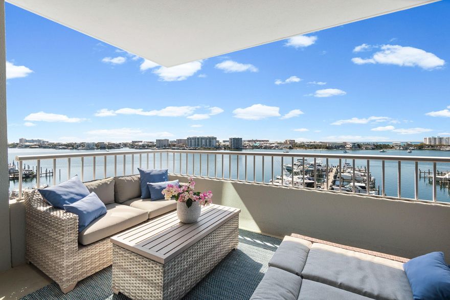 Welcome to an exceptional waterfront retreat in the highly sought-after Destin Yacht Club--where elevated coastal living meets front-row views of Destin's iconic harbor.

Perched on the 4th floor, this beautifully reimagined 2-bedroom, 2-bath residence offers sweeping, unobstructed views of emerald waters, passing boats, and breathtaking sunsets that paint the sky each evening. From the moment you step inside, you're greeted by a light-filled, open-concept design that perfectly frames the harbor beyond.

Every inch of this condo has been thoughtfully renovated with stunning, high-end finishes. The show-stopping kitchen is a true centerpiece--featuring sleek custom cabinetry, striking quartz countertops, designer hardware, stainless steel appliances, and an oversized island ideal for --> gathering and entertaining. The space flows effortlessly into the dining and living areas, all positioned to capture those incredible water views.

The primary suite is a serene escape, where you'll wake up to the harbor just beyond your windows. The spa-inspired ensuite bath has been completely transformed with dual vanities, custom tilework, modern fixtures, and a luxurious walk-in shower that rivals a boutique hotel experience. Two walk in primary closets allow for full time living without sacrificing space. 

The second bedroom is graciously located at the front of the condo and split from the primary sleeping quarters. A second full bathroom is beautifully updated and features a custom walk-in tiled shower. The guest hallway also boasts a bunk nook for additional sleeping space or storage. It the perfect spot to customize and make it fit your luxury living needs. 

Step outside onto your private balcony and take in the energy of Destin Harbor--watch fishing boats head out at sunrise, dolphins playing in the distance, and fireworks lighting up the sky on summer nights. This is coastal living at its finest!

Destin Yacht Club offers an unmatched coastal lifestyle with an impressive collection of resort-style amenities designed for both relaxation and connection. Residents enjoy access to a waterfront pool overlooking the harbor, a fully equipped fitness center, beautifully appointed gathering spaces, and a community kitchen perfect for hosting friends and family. The waterfront bar and entertaining areas create the ultimate setting for sunset cocktails, while the game room and shared spaces add to the vibrant, social atmosphere.

For boating enthusiasts, private boat slips are available for purchase, along with a dedicated dock, fish cleaning station, and seamless access to the harbor for days spent on the water. Additional conveniences include private storage closets and direct access to the HarborWalk--placing dining, entertainment, and the best of Destin right at your fingertips.

This exclusive, non-rental community is reserved for full-time residents and second homeowners, offering a more private, peaceful environment that truly sets it apart. Here, you're not just purchasing a condo--you're stepping into a refined waterfront lifestyle in one of Destin's most coveted locations. Welcome home!