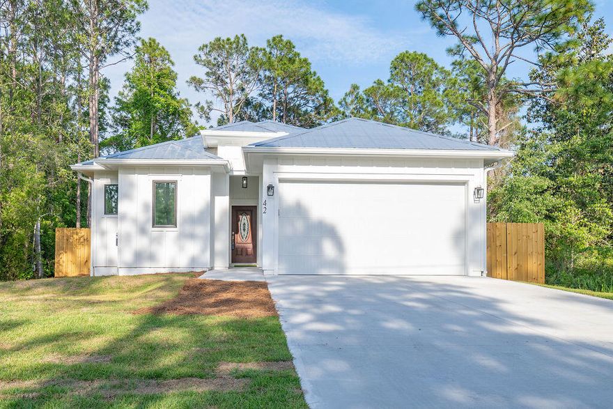 Are you looking for a brand new home in the desirable area of Santa Rosa Beach? Whether you're searching for a primary residence or a solid investment property with 'NO HOA' restrictions, this home is ready for you.

This brand-new home offers 1,880 square feet of heated and cooled living space, with a total building size of 2,435 square feet. It includes 4 bedrooms and 2.5 bathrooms and features a modern coastal design with an open-concept layout and high-quality finishes.

This home is built on a solid concrete slab foundation, providing stability and durability. It features 10-foot ceilings, quartz countertops, hardwood floors, stainless steel appliances, and abundant of natural light. The garage features a protective epoxy-coated floor, offering a long-lasting, low-maintenance surface, and provides ample space for a golf cart, equipment, or additional storage.

The fully fenced backyard provides privacy and a safe space for you and your beloved pets.

This home is a dream for outdoor enthusiasts, with plenty of activities nearby, including golf courses, hiking trails, and beautiful state parks. The Cessna Landing Boat Launch Park is less than half a mile away, and you're just minutes from multiple beach access points along 30A, perfect for enjoying the sugary beaches of the Emerald Coast.

Conveniently located near top-rated hospitals and medical centers, as well as fine dining, grocery stores, and shopping centers, everything you need is just a short distance away.

This home is completely move-in ready. Whether you're looking for beach living, rental income, or both, the choice is yours.
Call today to schedule your showing!