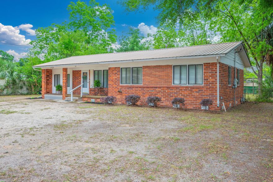 Investor Opportunity in the Heart of Crestview! Situated on a generous ¾-acre lot, this  home offers space, flexibility, and strong potential for the right buyer. Being sold as-is, the seller has priced the property with consideration for the age of the home's major components--making this an ideal option for cash buyers or investors looking to add to their portfolio. Inside, you'll find a move-in ready layout suitable for a tenant, featuring both a living room and a spacious 18x13 family room--perfect for a second living area, home office, or craft space. There's also a cozy Florida Room, ideal for curling up with a good book or enjoying a quiet retreat. Outdoors, the expansive lot provides room to spread out, garden, or expand, and includes a 4-inch deep well pump to support your gardening needs. The backyard is chain-link fenced, offering a defined space for pets or outdoor enjoyment. Conveniently located in central Crestview, this property offers easy access to shopping, schools, and historic downtown Crestview. Whether you're looking for a rental investment or a property with room to personalize over time, this one checks all the boxes for opportunity and value.