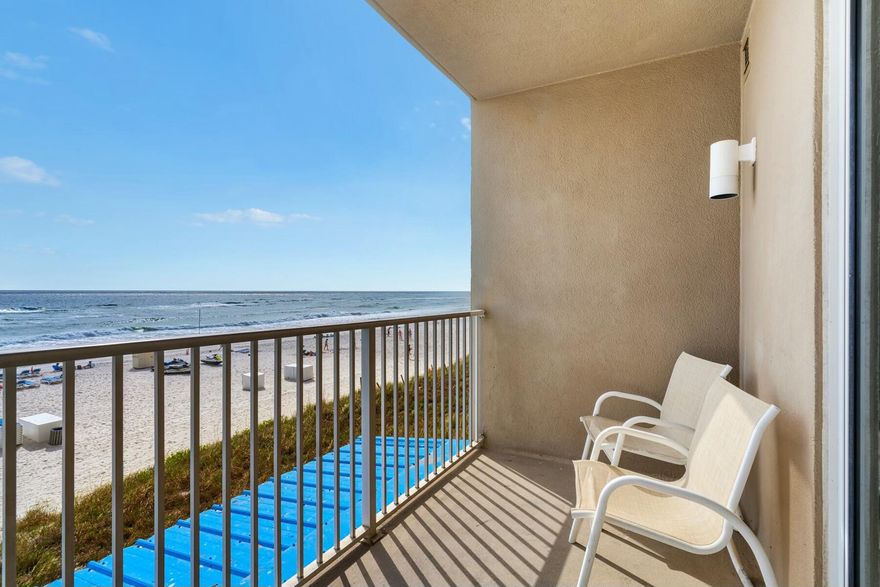 Panama City Beach. Gulf front + 3 pools. Granite/ & tile for easy up-keep. This 1-bedroom, 2-bathroom condo on Beach offers direct Gulf access with waterfront views from your private balcony. The unit features granite counters, tile flooring throughout, and an open floor plan maximizing the 934 square feet of living space. The kitchen flows seamlessly into the living area, while the primary suite includes an en-suite bathroom for privacy.Built in 2007, this gated community offers three resort-style pools including one indoor pool for year-round enjoyment. The unit requires no elevator access and sits conveniently close to covered parking. Hurricane-rated construction provides peace of mind for Gulf Coast living. The waterfront complex provides direct beach access and Gulf views.