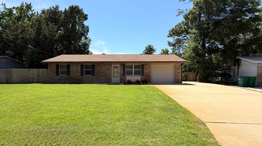 MOVE-IN-READY!  3BR/1.5BA Brick/Hardie Board home with is conveniently located EAST of Hurlburt & just minutes from bases, beaches, and schools! Nestled in a quaint neighborhood, this well-maintained home offers low-maintenance flooring throughout  (NO CARPET) and a thoughtfully designed plan featuring TWO separate living areas. The updated kitchen has wood cabinets with soft-close drawers, granite countertops, and stainless steel appliances. All three bedrooms are generously sized and all closets are cedar-lined!  Major updates include Vinyl Double-Paned Windows (2018); Large Bonus Room (2018); Dimensional Shingled Roof (2018); Electric/Tankless Water Heater; Garage Door (2016); & Updated HVAC (2020). Owner says average power bills are approximately $150/month!  The full bath has a faux marble vanity & tub/surround. The half bath also has an updated vanity.  Enjoy endless hot water with the electric tankless water heater! Ceilings have a Spanish Lace texture - No Popcorn!  Outside, the large privacy-fenced backyard is perfect for entertaining with 2 patios, a lush lawn, wifi sprinkler system, gutters, lawn pump, and extra parking extending beyond the double gate with pavers.  A large storage building and an additional shed on a concrete slab provide ample storage for tools, lawn equipment, and hobbies. If you're looking for a lovingly cared-for home with affordable utilities (approx. $150/mth) & exceptional outdoor space, schedule your showing today!