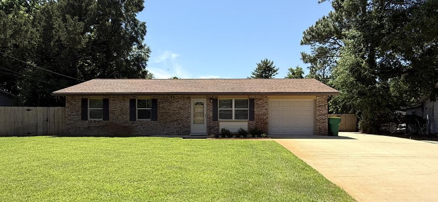 MOVE-IN-READY!  3BR/1.5BA Brick/Hardie Board home conveniently located EAST of Hurlburt & just minutes from beaches, bases, & schools! Nestled in a quaint neighborhood, this well-maintained home offers low-maintenance flooring throughout  (NO CARPET), TWO separate living areas. The updated kitchen has wood cabinets with soft-close drawers, granite countertops, and stainless steel appliances. All three bedrooms are generously sized. All doors are Solid Core & all closets are cedar-lined!  Major updates include Vinyl Double-Paned Windows (2018); Large Bonus Room (2018); Dimensional Shingled Roof (2018); Electric/Tankless Water Heater; Garage Door (2016); & Updated HVAC (2020). Owner says average power bills are approximately $150/month!  The full bath has an updated vanity & faux marble tub/surround. The half bath also has an updated vanity. Enjoy endless hot water with the electric tankless water heater!  Ceilings have a Spanish Lace texture - No Popcorn!  Outside, the large privacy-fenced backyard is perfect for entertaining with 2 patios, a lush lawn, wifi sprinkler system, gutters, lawn pump, and extra parking extending beyond the double gate with pavers.  A large storage building and an additional shed on a concrete slab provide ample storage for tools, lawn equipment, and hobbies. If you're looking for a lovingly cared-for home with affordable utilities (approx. $150/mth) & exceptional outdoor space, schedule your showing today!