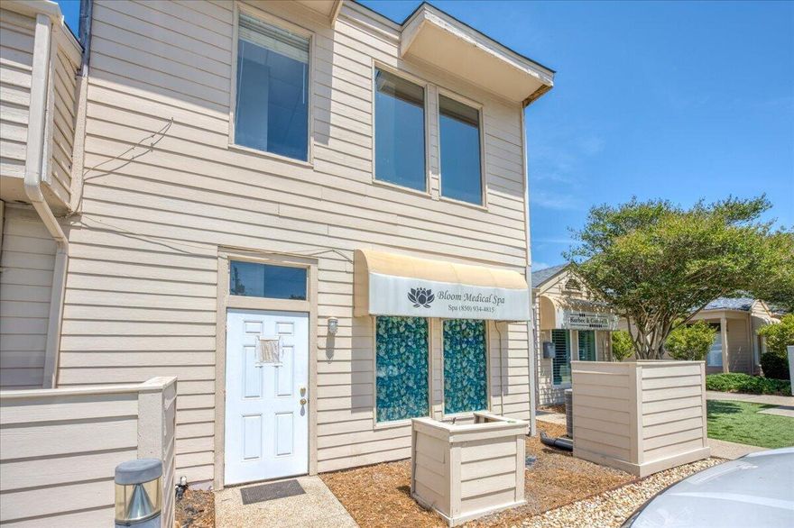 Located in the heart of Harbourtown in Gulf Breeze Proper, this versatile two-story commercial property presents an excellent investment opportunity. Harbourtown is a well-established business center featuring a mix of shops, restaurants, and professional services, with foot traffic that supports a variety of business types! The building is thoughtfully designed with two separate commercial units, one on the ground floor and one upstairs, offering flexibility for multiple income streams or business uses. The downstairs unit is currently leased with a tenant in place through 2028, providing immediate, stable income for the new owner. The upstairs unit is vacant and ready for occupancy, featuring four private rooms and a welcoming lobby area. This layout is ideal for office use, boutique ser vices, or other professional ventures. Whether you're looking to expand your portfolio or establish a presence in a thriving commercial hub, this property provides strong long-term investment potential and flexibility for future growth.
