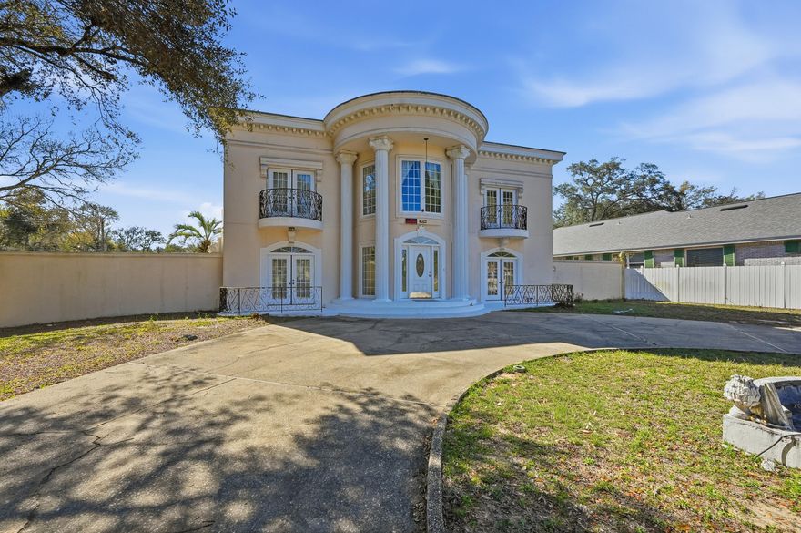 Your dream opportunity awaits with this corner lot, an extraordinary two-story estate which exudes timeless
elegance from its presence along Mooney Road in Fort Walton Beach, Florida. A true beauty offering both charm and tranquility, the elegant interior features detailed crown molding, showcasing exceptional craftsmanship,
while 10-foot ceilings enhance the home's bright, and extremely open feel.
The home features a large swimming pool, generous size bedrooms, an office, a detached two-car garage, stately
columns, balcony, and a grand staircase. Inside, you'll find Grecian marble floors, an expansive foyer, a spacious formal living room with a fireplace, and an owner's suite bathroom right out of a fairytale storybook. A dedicated music/sunroom overlooks the oversized pool, adding a unique and refined touch. A circular driveway completes
the impressive exterior.

Rich in character and scale, every corner of this home was
thoughtfully planned and crafted with care. This is your
opportunity to create something truly special, an elegant
canvas with endless possibilities. Add your personal touch
and make this house the talk of the town once again.

Schedule your private showing today!

Buyer(s) is responsible for verifying ALL data and information including lot size and room measurements as it is deemed to be reliable but not guaranteed.