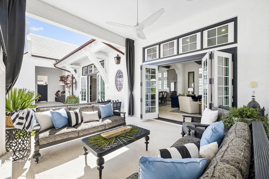 Thoughtfully positioned along the meandering path of Turtle Bale Park North, this exceptional four-bedroom, seven-bathroom residence offers nearly 3,900 square feet of beautifully designed living space and captures the essence of refined coastal living in Alys Beach. From the moment you enter the stately foyer, the home opens into expansive, light-filled interiors where open-concept living seamlessly blends comfort, elegance, and effortless entertaining.
The chef's kitchen is both stunning and functional, appointed with premium Miele appliances, abundant custom cabinetry, and a thoughtfully designed scullery that provides additional prep space, storage, and organization. Throughout the home, an abundance of storage ensures practicality without compromising design.
A junior primary suite on the main level offers privacy and flexibility for guests or multi-generational living. Upstairs, additional guest suites provide luxurious accommodations, while a spacious upper terrace delivers sweeping panoramic views and one of the most breathtaking sunset vantage points in Alys Beach.
Designed to blur the line between indoor and outdoor living, the private courtyard features a sparkling pool, outdoor seating, grilling area, and a cozy fireplace. Expansive nano doors fully open the living space to the courtyard, creating an incredible setting for entertaining and relaxation. Enhancing the experience further are surround sound, full home automation, and a distinctive Moroccan-inspired aesthetic that adds warmth and character throughout.
Additional highlights include an architectural staircase that anchors the home's grand design, an oversized two-car garage, and elegant finishes throughout. Offered partially furnished, this extraordinary residence embodies luxury coastal living at its finest and truly checks every box for the discerning Alys Beach buyer.
Alys Beach offers a lively town center with curated dining and shopping options that create a true resort-style atmosphere.  The community is designed by thoughtful green spaces as well as the renowned Alys Beach Homeowner Amenities.