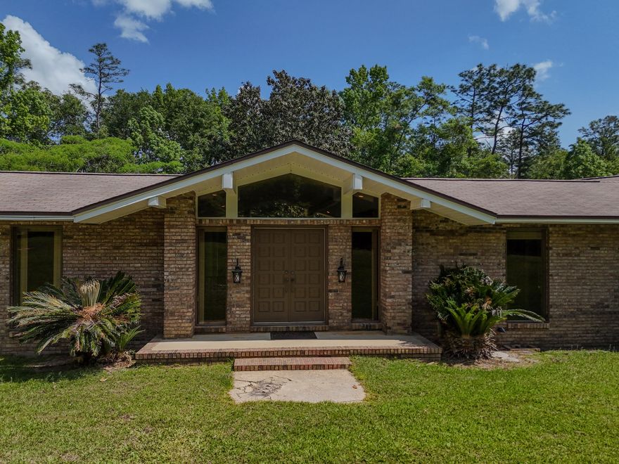 Tucked away on a generous 17.5-acre parcel, this charming 2,899 SF, 4-bedroom, 2.5-bath home offers a rare blend of space, character, and peaceful surroundings.Step inside to discover a classic sunken living room, where oversized windows fill the space with natural light and picturesque views of the landscape. The home retains many of its original features, adding a sense of timeless warmth and personality throughout. Each bedroom offers ample space, while the 2.5 baths ensure convenience for both residents and guests.
Located within walking distance to the scenic beauty of Falling Springs National Park.The property is also zoned for Kate Smith Elem, Rouhlac Middle, and Chipley High School.