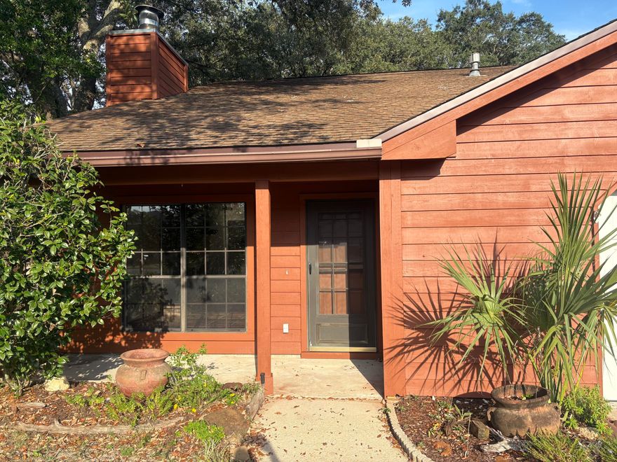 Step inside this two-story home featuring soaring vaulted ceilings and a cozy wood-burning fireplace in the spacious living area. The open-concept kitchen with butcher block bar flows seamlessly for easy entertaining, and through the sliding glass doors to the screened-in back porch provides a relaxing spot to unwind.
Conveniently located directly across from Northwest Florida State College, with easy access to Destin and Fort Walton Beach, Eglin AFB, 7th Group, and EOD—all while avoiding central Niceville traffic.
This home offers 3 bedrooms, 2 bathrooms, and ample closet space. The fully fenced backyard is ideal for pets or play. Additional features includes *excellent attic insulation*natural gas outlet for an outdoor grill or heater, *wood-stained trim, *a whole-house attic fan for quick ventilation cool fall evenings.  Main bedroom has two closets, one has built in desk.
The home is largely in its original condition, providing buyers the opportunity to make updates and design choices to fit their personal preference.  Additional information: Electrical -Square D,QO electrical panel and all copper wiring; Plumbing: Gas Water Heater with all copper piping:HVAC original, but in good working order; Roof- "30 year" Architectural/Dimensional (2008) in good condition
This property is well-suited as a primary residence or investment opportunity. Buyer to verify all dimensions, features, and information deemed important.
Schedule your showing today!