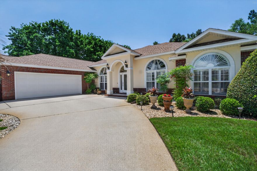 Tasteful, stylish, and thoughtfully designed, this custom-built 4-bedroom, 3-bath residence was created for those who appreciate spacious living and effortless entertaining. From the moment you step through the beautiful etched glass entry, the quality craftsmanship and extensive upgrades are immediately apparent. Smooth 9-, 10-, and 11-foot ceilings, rounded wall corners, elegant custom window treatments, and carefully selected finishes create an inviting sense of sophistication throughout. At the heart of the home is an exceptionally large eat-in kitchen and dining area designed to bring people together. Whether hosting holiday gatherings, dinner parties, or casual family evenings, this impressive space flows seamlessly into the centrally located family room and beyond to the outdoor living area. A dramatic 9-foot sliding pocket door opens completely to the covered lanai and heated pool, creating an expansive indoor-outdoor experience ideal for Florida living. The thoughtfully designed split floor plan offers privacy and comfort, with the owner's retreat tucked away at the rear of the home. The spacious primary suite features elegant tray ceilings and French doors leading into a truly luxurious spa-inspired bath. Indulge in the oversized Roman shower, relaxing soaking tub, dual vanities, private water closet, and expansive walk-in closets complete with built-in shelving and dressers designed to maximize space and organization.Guest bedrooms are generously sized with abundant storage, including one featuring an impressive walk-in closet with an additional private storage room. The third bath conveniently serves both the family room and pool area, making outdoor entertaining even more effortless. And for those who appreciate exceptional garage space, this oversized 717-square-foot garage delivers room for vehicles, storage, hobbies, and a dedicated workspace. Situated on a beautifully landscaped corner lot with extra elbow room and curb appeal, this home combines luxury, function, and everyday comfort. Additional features include hurricane panel hardware for added peace of mind. Built to live large and designed to enjoy--this is a home that truly lives as beautifully as it looks.