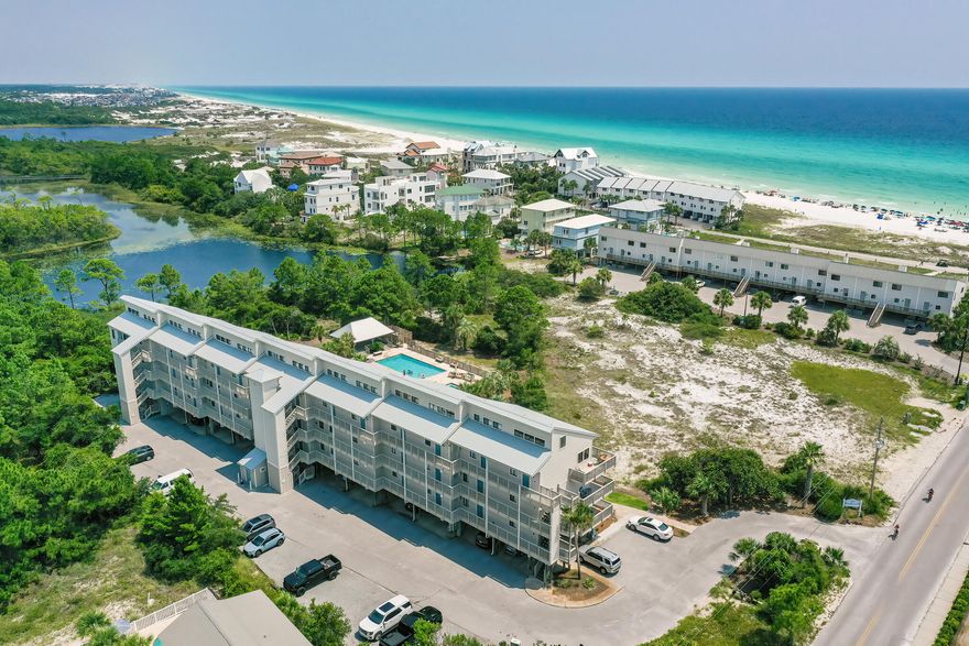 'SEASIDE SERENITY', A 'GULF & LAKE VIEW', 4TH FLOOR CONDO, SOUTH OF 30A! Beachfront II Condos is located just 1/2 Block from the Sugar White Sands and Emerald Green Waters of the Beautiful Gulf of Mexico!!! TOTALLY REMODELED & MOVE IN READY!!! Enjoy your morning coffee while listening to the waves crash on the shore or let them put you to sleep at night! This Condo is Located on the Third floor and overlooking the Brand-New Pool, Hot Tub and a Large Gazebo. There is 2 years rental revenue history in addition to having the next 5 months of almost totally booked gross revenue of $14,000 that can be assumed by the buyer. From the moment you walk in you will notice the 30-foot vaulted ceilings and TOTALLY OPEN FLOOR PLAN.