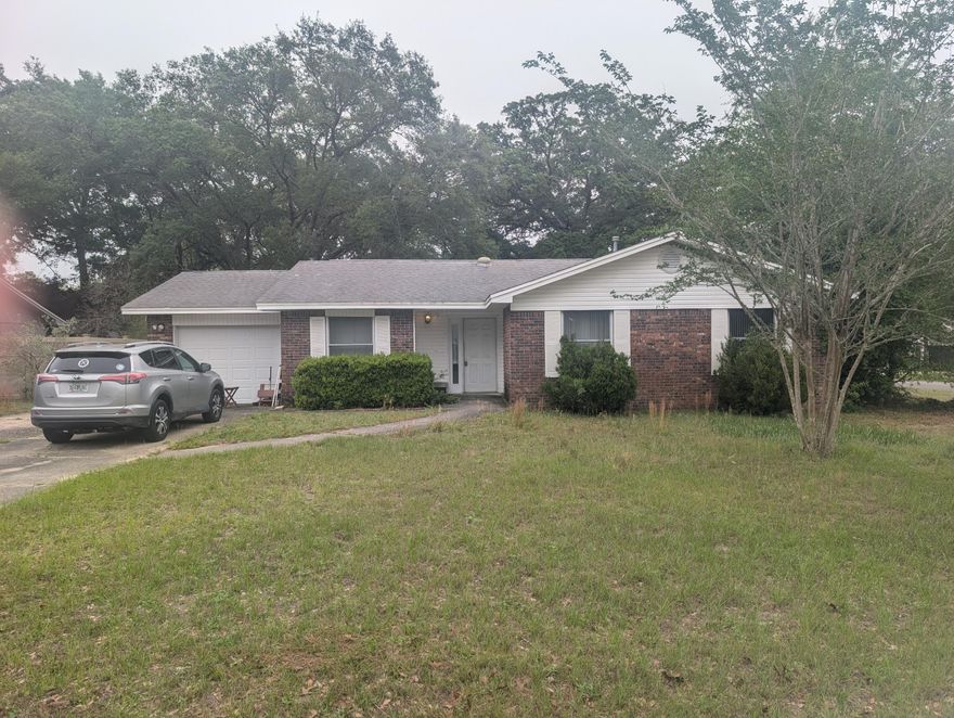 NO HOA!!! This property sits on a spacious corner lot with oversized parking and excellent accessibility, featuring a side entrance to the backyard with an additional small driveway -- perfect for extra vehicles, boats, trailers, or future improvements. The large lot offers plenty of room to expand, entertain, or create your ideal outdoor space.
Inside, the home has solid bones and several valuable updates already completed, including an HVAC system that is approximately 6 years old and a newer water heater. The layout includes a great Florida room located off the primary bedroom, creating a flexible space for relaxing, an office, sitting area, or additional living space with views of the backyard. The home does need cosmetic work and updating, making it an excellent opportunity for sweat equity.