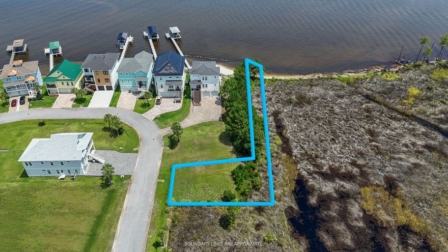 Own your own little piece of bay front paradise with unobstructive views nestled in the gated community of Clipper Bay.  Being able to have a dock for your boat and no one able to build behind or to the south side, this lot offers privacy and stunning views of the bay and marshland for your dream home.  Large enough for a 2500 sq. ft. home. Permit is in place for 240' boardwalk & 60' access pier for your boat.  Permit would need to be reauthorized.  This lot is ready to be built on with water connection, sewer tap and power.