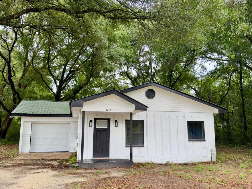 Welcome to 5410 Malcolm Tucker Rd, Crestview, FL 32536! This move-in-ready home offers a rare combination of durability and modern updates with solid concrete construction and extensive renovations completed in 2022. Major improvements include a new HVAC system, new kitchen appliances, updated lighting throughout, and a new electrical panel. A brand-new garage door was recently installed May 2026, adding to the home's appeal and functionality.
The solid concrete walls and ceilings provide exceptional strength, energy efficiency, and low-maintenance ownership. Inside, you'll find updated finishes and a functional layout ready for its next owner. Situated on a spacious lot, this property offers room to enjoy outdoor living while still being conveniently located near shopping, dining, schools, and all that Crestview has to offer.