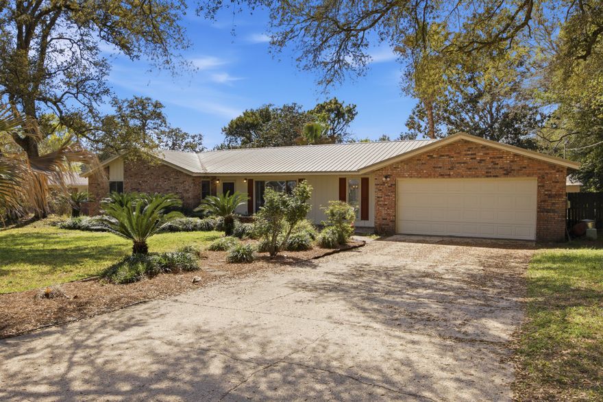 ***Home Sweet Home***This 4 bed, 2 bath 2 car garage home offers a comfortable, OPEN layout, inviting FIREPLACE, and dedicated DINING space-perfect for everyday living.The kitchen features GRANITE countertops, NEW appliances, and a PANTRY, while the primary suite includes a LARGE closet and an UPDATED vanity for a fresh, functional feel. Major upgrades include HVAC (2024), WATER HEATER (2025), and a METAL ROOF (2017), giving you peace of mind. Step outside to a PRIVATE OVERSIZED backyard surrounded by MATURE trees, complete with a GAZEBO and a Privacy fence with Rear access from 12th Street (great for Boat or RV storage) Large Shed and storage room off the garage, PAID OFF solar panels keep the power bill around $30/month. This home checks all the boxes for comfort,efficiency, and location