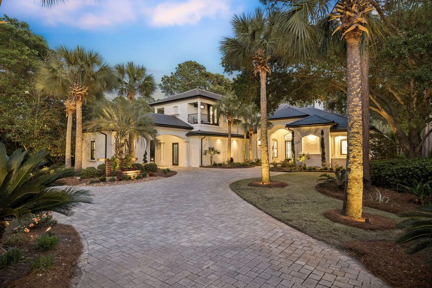 Welcome to a truly exceptional Burnt Pine estate, masterfully designed by renowned builder Maurice Sweet and thoughtfully reimagined to reflect a refined, modern standard of luxury. Set along the 18th fairway of the Burnt Pine Golf Course on nearly three-quarters of an acre, this custom residence pairs timeless architecture with extensive recent enhancements, creating a private retreat that is as functional as it is striking.

From the moment of arrival, the home's presence is undeniable. Stately columns, smooth pavered drives, and a brand new concrete tile roof introduce a timeless architectural presence, while covered parking, an oversized two-car garage, and a dedicated golf cart garage speak to both scale and convenience. A freshly painted exterior and updated architectural detailing further elevate the home's curb appeal, setting the tone for the level of quality carried throughout.

Inside, the home unfolds with a refined, modern aesthetic defined by clean lines, bright, airy finishes, and immense natural light. You're welcomed by a striking formal sitting area, where a floor-to-ceiling picture window frames the expansive outdoor living space, pool, and sweeping golf course beyond, an immediate focal point that draws the eye and sets a sophisticated first impression. Thoughtfully positioned alongside, the formal dining room and adjacent wet bar create an ideal setting for both intimate dinners and elevated entertaining, offering a seamless connection between gathering spaces while maintaining a sense of distinction and elegance.

At the heart of the home, a completely reimagined kitchen blends form and function with remarkable precision. Recently fully renovated, it features custom cabinetry, elevated countertops, and a suite of Thermador appliances, thoughtfully designed to support both casual gatherings and elevated culinary experiences. A statement design moment in its own right, the kitchen pairs refined finishes with an intentional layout, serving as both a visual centerpiece and a natural gathering place within the home. The adjacent living spaces flow seamlessly, enhanced by updated built-ins, curated finishes, and a whole-home Sonos sound system that brings a cohesive sense of modern living.

Designed to fully embrace the outdoor lifestyle that defines Sandestin, the exterior living spaces feel like a private retreat within the resort. The newly enhanced outdoor kitchen anchors the covered entertaining area, complete with custom cabinetry, upgraded appliances, and generous space for gathering. Just beyond, the outdoor living and dining area invites year-round enjoyment, anchored by a fireplace and television, perfectly suited for relaxed evenings, game days, or effortless entertaining in every season. Enhanced by multiple new ceiling fans and beautiful pecky cypress beams, the space is designed to remain comfortable and inviting even in the height of summer.

The saltwater pool and spa are surrounded by lush, tropical landscaping that brings a sense of seclusion and serenity, creating an atmosphere that feels worlds away, more akin to a private island oasis than a traditional backyard. Thoughtfully updated pool equipment, including a new pump, heater, and lighting, ensures both beauty and performance. As evening falls, an extensive landscape lighting design further enhances the home's resort-like ambiance, casting a warm, inviting glow across the entire setting and elevating the experience well into the night.

The first-floor primary suite offers a private retreat, thoughtfully positioned with direct access to the pool deck for seamless indoor-outdoor living. Generously scaled and finished with luxurious carpeting underfoot, the bedroom provides a quiet sense of comfort and refinement. The primary bath has been entirely reimagined, featuring expansive counter space with an integrated vanity, dual sinks, an elegant soaking tub, and a stunning separate shower with custom tile work, creating a spa-inspired environment designed for both relaxation and everyday indulgence.

Additional first-level spaces are thoughtfully designed to support both everyday living and effortless entertaining, including a well-appointed powder bath conveniently located off the formal gathering areas and a dedicated pool bath for added ease. A private study or flex space offers versatility to suit a range of needs, while a spacious laundry room with custom built-ins and ample counter space enhances daily functionality. Two additional guest bedrooms on the main level offer generously sized, well-appointed accommodations, providing both comfort and privacy for family and guests alike. A striking stone-walled wine cellar designed to accommodate up to 238 bottles alongside a wine refrigerator and additional storage for wine crates serves as both a functional amenity and a refined focal point within the home.

Step into the convenient wood-paneled elevator for effortless access to the second level, where a spacious loft-style suite offers a flexible and inviting retreat. Complete with a full bath featuring dual sinks, the space is thoughtfully designed with custom-built alcoves that serve as charming sleeping quarters or quiet reading nooks, adding both character and versatility. A beautifully appointed den with custom built-ins and comfortable, lounge-style seating creates a warm and welcoming gathering space. An additional private bedroom with its own en suite bath provides well-appointed accommodations for guests, while a conveniently located wet bar enhances the functionality of the level, ideal for hosting or relaxed evenings in. Outdoor living continues with a private balcony at the front of the home and an expansive rear terrace overlooking the pool and golf course, offering multiple vantage points to take in the surroundings.

Extensive recent improvements further enhance the home's turnkey appeal, including a new roof installed in 2025, all new gutters and eaves, updated HVAC systems, and a new tankless water heater. The home has been freshly painted inside and out, and thoughtfully updated complemented by new kitchen appliances and a new washer and dryer. Together, these enhancements provide a level of quality, comfort, and peace of mind that allows the next owner to enjoy the home for years to come.

Located within the exclusive, gated enclave of Burnt Pine, residents enjoy access to the most prestigious neighborhood within Sandestin Golf and Beach Resort. Spanning over 2,400 acres from the bay to the beach, the resort offers miles of golf cart and pedestrian pathways winding through lush landscapes and along scenic lagoons, seamlessly connecting an array of world-class amenities. Championship golf, tennis and pickleball, a full-service marina, and the vibrant Village of Baytowne Wharf for dining, shopping, and year-round events are all within reach. Just beyond the gates, Grand Boulevard and the Market Shops at Sandestin provide an additional layer of dining, retail, and everyday convenience.

This is a home where timeless design meets modern refinement, offering a level of privacy, quality, and lifestyle that is truly exceptional within Burnt Pine.