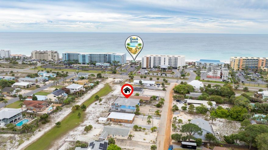 Welcome to a truly one-of-a-kind opportunity on Okaloosa Island- where creativity, craftsmanship, and family living come together.  Built in 1978 through the vision of an engineer and an interior decorator, this expansive 2 story home offers a rare blend of thoughtful design and artistic flair.  Every corner reflects a balance of structure and style, creating a residence that is as functional as it is distinctive.  Designed with flexibility in mind, the home is perfectly suited for multigenerational living or a custom reimagining of you dream coastal retreat.  
The second floor lives like a complete residence of its own, featuring three spacious bedrooms, a large kitchen, open living area, laundry and a stunning balcony that captures serene bay views. The first floor offers incredible versatility with two primary bedrooms, a bunk area, full kitchen, office space, laundry, and a comfortable living room that opens onto a covered-  walk-out porch-- perfect for entertaining or unwinding in the coastal breeze. 

With its gererous layout, unique character, and prime island location, this home presents endless opportunities- whether you envision updating, expanding, or preserving its original charm.  A rare find with room to grow, adapt and truly make your own.

Features:   Steam Shower, Sauna, Beach access within 1/4 mile, bay view, easement behind home so no one can build behind you. two laundry rooms, two kitchens