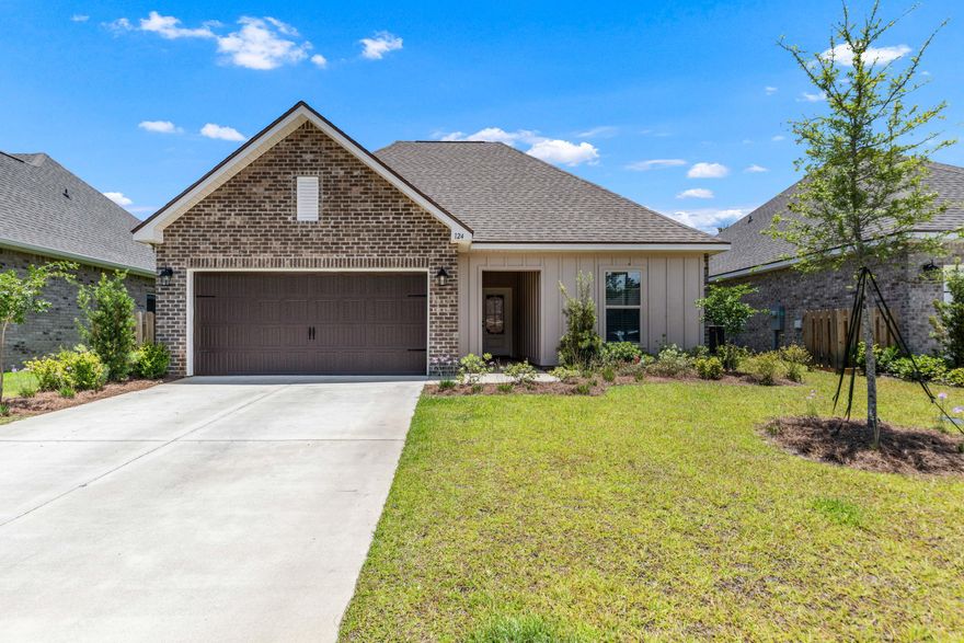 This like-new home built in 2024 is located just 4 mins from both the Creekside Clubhouse and the Bayfront Clubhouse! Beautiful covered entry leads to a spacious foyer, impressive great room, gourmet kitchen and dining. The split floor plan is ideal w/ many upscale features including; wood-look tile throughout, quartz countertops, stainless appliances, all wood shelving, upgraded lighting, crown molding in living areas, primary suite w/ double vanity, garden tub, separate custom tiled shower w/ frameless door and walk-in closet, drop zone/mud room with bench and closet, undermount sinks, framed mirrors, separate laundry with closet, flood lights, covered patio and too much to list! Just 5 minutes from the new Creekside Amenity Center w/ swimming pool and owners club, & access t all amenities of Hammock Bay such as the Bayfront Clubhouse and pier, 24/7 fitness, 60 acre sports complex, walking trails, The Windmills town center, tennis, pickleball, disc course, amphitheatre, and full time Events Coordinator to name a few!  Your new home awaits at 124 Apollo Avenue! Buyer to verify all information impt to them.