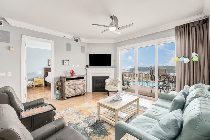 This beautifully updated 3 bedroom, 3.5 bath condominium is a must see. Located in the exclusive Sanctuary at Redfish development, where residents and guests enjoy a unique coastal amenity: a private water taxi that transports owners and guests across Big Redfish Lake directly to the beach, offering a scenic and effortless way to reach the Gulf. Ideally positioned within the building, the residence captures breathtaking views of the resort style pool, cabanas, Big Redfish Lake, and the Gulf of Mexico beyond. The oversized outdoor terrace provides the perfect setting for relaxing or outdoor dining while enjoying the peaceful surroundings. Offered fully furnished, this immaculate condominium is well suited for both personal enjoyment and rental guests. The open floor plan with a split primary bedroom design includes en suite guest quarters and a convenient powder room. This luxurious gated complex, nestled away from the hustle and bustle, is surrounded by nature and a coastal dune lake. Sanctuary at Redfish offers a relaxed atmosphere while being within walking or biking distance to restaurants, shops, and retail.