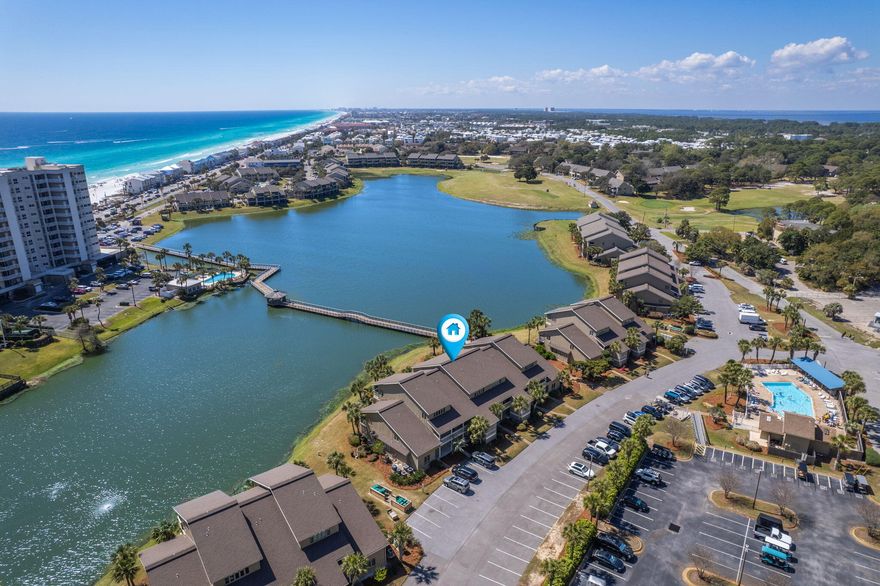Over $35,000 In reservations on the books for 2026. MOTIVATED SELLER! Price adjustment to $629,999, on this turn-key, lakefront 3BR/3BA townhome in Seascape Resort. Proven $60K-$68K+ gross rental income annually with 2026 already pacing +18%. Identical unit next door sold $675K in July. Delivered fully furnished & rental-ready - future bookings, financials & mgmt transfer at closing. Direct Stewart Lake views, steps to 2,000 ft of deeded beach, pools, golf, tennis & Whale's Tail. Rare 3 full baths, ground-floor BR, sleeps 8-10 easily. Low $1017/mo HOA covers nearly everything. Best priced, highest-producing lakefront 3/3 in Seascape today. Seller says SELL - bring offers! Take a quick, easy walk to enjoy your deeded beach access, a provision exclusive for Seascape residents. Indulge in endless afternoons under the sun, against a backdrop of serene- Gulf views that are only steps away. Residing here means having the power to enrich your every day with an invigorating and opulent coastal lifestyle.The Seascape Resort is a well-established community known for its generous amenities and vibrant social scene. Engage in a friendly match on the Tennis or Pickle Ball courts, challenge your friends at a round of golf, or simply let loose at one of the lively resort concerts. Your options for leisure or recreation are boundless. Situated close to the beach, this condo guarantees seaside living at its finest - where every day feels like a vacation. Don't miss the chance to own a piece of this charming paradise. Get in touch today to schedule a showing, and see for yourself the promise of unrivaled luxury and leisure that this Condo holds.