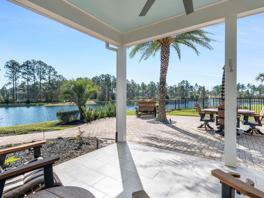 Welcome to refined coastal living in this stunning Craftsman-style lakefront residence, custom built by Steve Mitchell of Driftwood Custom Homes. Ideally situated on a quiet cul-de-sac within a gated, non-rental community, this 4-bedroom, 4-bath home with a dedicated office and second-floor bonus room offers 2,975 square feet of thoughtfully designed living space, .24 of an acre lot and 126 feet of frontage on a serene, four-acre spring-fed lake. Lakeview Subdivision is surrounded by Walton County owned land and State Park property. Located off of Thompson Road just 0.4 miles to Santa Rosa Golf & Beach Club and approximately 0.7 miles to Scenic 30A and several beach accesses via Allen Loop Drive and East Seashore Circle South. Designed for both comfort and entertaining, this two-story home features two fireplaces (indoor and outdoor), tiled covered porch with outdoor fireplace and large ceiling fan in the back yard, outdoor shower, expansive brick paver patios, a private outdoor wood burning fire pit, and lush tropical landscaping. The main level showcases a spacious primary suite overlooking the lake, along with an additional guest bedroom, private office, and convenient laundry room with custom cabinets and laundry sink. Upstairs, you'll find two additional bedrooms, a second living area/bonus room, and an additional office space--perfect for guests or multi-generational living. A second primary suite upstairs features a private balcony overlooking the lake and a large walk-in closet.
The kitchen is beautifully appointed with quartz countertops, a walnut island countertop finished with linseed oil, gas range, Frigidaire appliances, and custom cabinetry. Additional upgrades include raised ceilings in living area, crown molding throughout, custom window blinds, custom built in closets in both master bedrooms, a Culligan water filtration system, impact resistant windows and doors, fully irrigated yard with irrigation well, bead board along the walls and ship lap over the living room fireplace, gas hot water heater, gas fireplaces, exterior is a combination of brick and cement fiber siding, brick paver driveway with room for 4+ cars, tiled garage floor, and professionally designed landscaping!
Enjoy the benefits of a golf cart-friendly neighborhood with a community pool with bathrooms and bathing facilities, and private path access to Helen McCall Park--a beloved local destination featuring a splash pad, playgrounds, sports fields, a real skate park, walking trails, and picnic areas. Sit outside and enjoy the tropical paradise, build a fire in the outdoor fire pit, enjoy all the wild birds who visit daily or fish right out of your own backyard! 
With low HOA fees of just $275/month and a peaceful setting in the back of the neighborhood, this exceptional lakefront home offers the perfect blend of luxury, privacy, and proximity to the best of 30A living! Near by restaurants include The Vue, Stinky's, all the joys of Gulf Place, Ed Walline beach access and Shunk Gulley. Call and schedule your showing today!