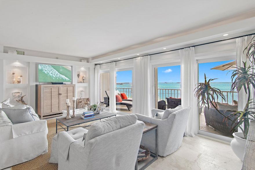 Rarely available and truly exceptional, this  waterfront residence at Waterview Towers Yacht Club delivers commanding views of the Gulf, East Pass, and Destin harbor from an ideal second-floor elevation. Expansive balconies create a front-row experience to Destin's iconic boating lifestyle and breathtaking sunsets.

This refined coastal retreat offers 3 bedrooms, 3 bathrooms, plus a bunk room, enhanced by crown molding, plantation shutters, and a well appointed kitchen. Thoughtfully designed for both elegance and comfort, the open living space features a fireplace and wet bar, framed by luxurious coastal décor and abundant natural light.

A rare offering for boating enthusiasts, the residence conveys with a 14' x 30' deep-water boat slip
