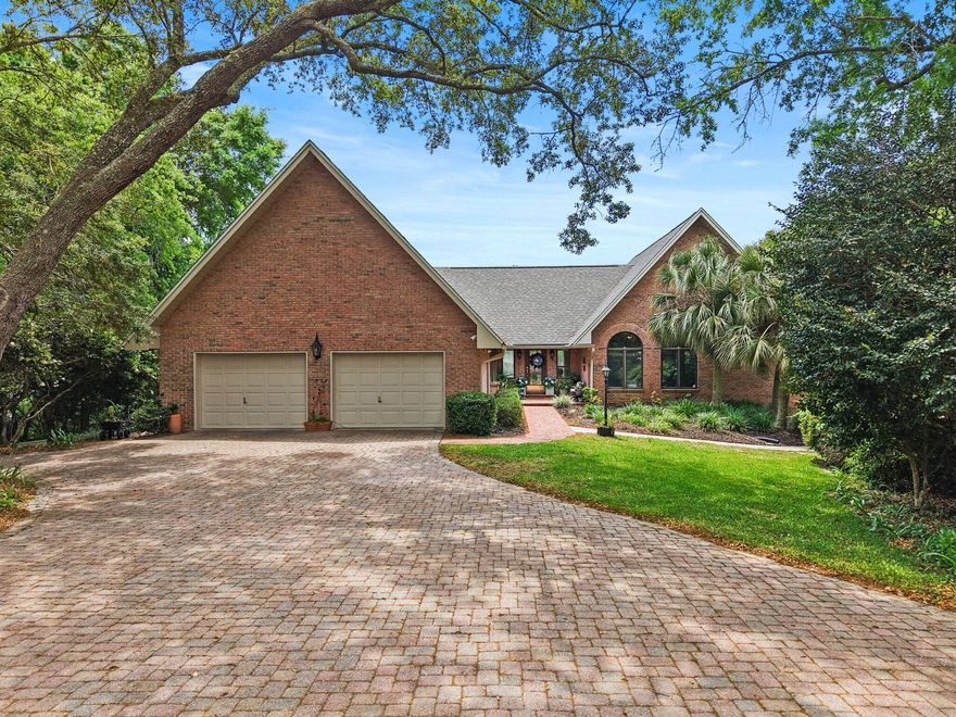 Nestled on over half an acre in the Rocky Bayou Neighborhood, this spectacular lakefront estate offers an unparalleled view of Lake Henderson. The main level is a masterclass in architectural warmth, highlighted by soaring 20-foot vaulted ceilings finished with pickled pine tongue-and-groove natural wood. Floor-to-ceiling windows bathe the living spaces in natural light while providing a breathtaking backdrop of the pond and pool. The expansive living room, anchored by a cozy wood-burning fireplace, flows seamlessly into the kitchen and dining areas, all positioned to capture the serene water vistas.

The primary suite serves as a true retreat on the main floor, uniquely featuring separate ''his and her'' bathroom vanity rooms with individual walk-in closets. Downstairs, the walk-out lower level is greeted with a flexible office/den space and offers a spacious bonus area three generous bedrooms and a shared bathroom. Outdoor living is equally impressive with a sparkling inground swimming pool and lush grounds leading to the water's edge. Practicality meets luxury with a functional central vacuum system and an oversized two-car garage featuring over 700 square feet of floored attic space above; perfect for storage or a potential workshop. This is a rare opportunity to own a distinctive, light-filled retreat in one of the area's most scenic locations. Tour today!