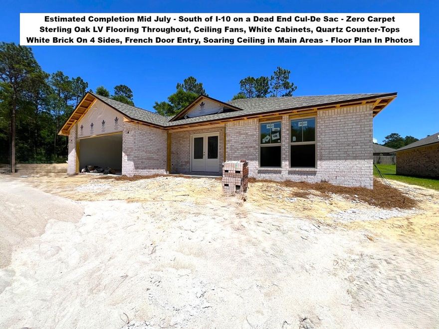 White Brick on 4 Sides - South of I-10, Located on a Cul-de-Sac. FLOOR PLAN IN THE PHOTOS. Estimated Completion Mid July - Front Photo is of the Actual Home. Addition Photos are Samples from the Same Floor Plan Previously Built. Brand New 4 Bedroom, 2 Baths, 2 Car Garage. STERLING OAK LV Flooring THROUGHOUT the entire house. Soaring Ceilings in the Main Areas. Kitchen with SHAKER WHITE Cabinets, Quartz COUNTER-TOPS, WALK-IN PANTRY - STAINLESS STEEL Smooth Top Range, Dishwasher, & OTR Microwave. Dining with 2 Slider Doors, Oversized 9 LIGHT CHANDELIER & Spacious Living Room with 66-inch Ceiling Fan & Soaring Ceilings. MASTER SUITE with Double Quartz TOP VANITY - LARGE Walk-in Closet, SEPARATE Tub and Shower & Private Water Closet. ALL Bedrooms have Ceiling Fans and there is zero carpet in this home. BUILDER PAYS MOST CLOSING COST, ASK FOR DETAILS. Astroguard Hurricane Fabric is included with this home. Garage Door Opener with MyQ App Access. THE SUBDIVISON OF CAMILLE COVE IS IN A GREAT LOCATION ON THE South End of Crestview and CAN BE ACCESSED BY TURNING AT THE 1ST RED LIGHT ON THE SOUTH END OF CRESTVIEW.
