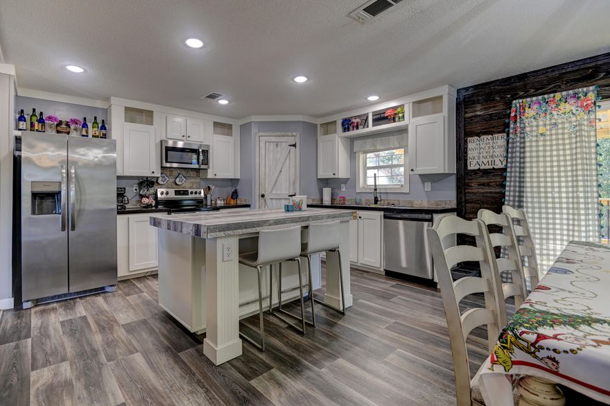 Country Living at it's Finest!
Discover this nearly new, stunningly large modular home, perfectly blending serene country living with unparalleled convenience. Situated on over an acre of pristine, cleared land, this property offers the space and tranquility you've been dreaming of, all less than half a mile from Highway 90. 
Step inside to find a meticulously designed interior boasting well-appointed finishes throughout. The spacious, open floor plan features modern amenities and elegant touches that create a warm, inviting atmosphere for both everyday living and entertaining. 
Outside, the expansive grounds provide endless possibilities, from gardening to recreation. Pet owners will delight in the large, pre-installed dog run.