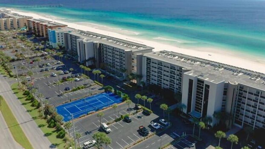 Owner has renovated the master bath to include a shower. New W/D and appliances are a few years old. New vinyl plank flooring.  Unit has an average gross rental revenue of  42K annually.  Project has a tennis/pickleball court, 2 pools, one behind each building, fitness center to include a sauna and a large event room.  
Project had SIRS report done and passed with flying colors. New roof on both buildings in within last 3 years, all units have new railings, parking lost milled and new surface in 2025, and next paint and seal will be done fall of 2026. Magnificent view from this 5th floor unit.