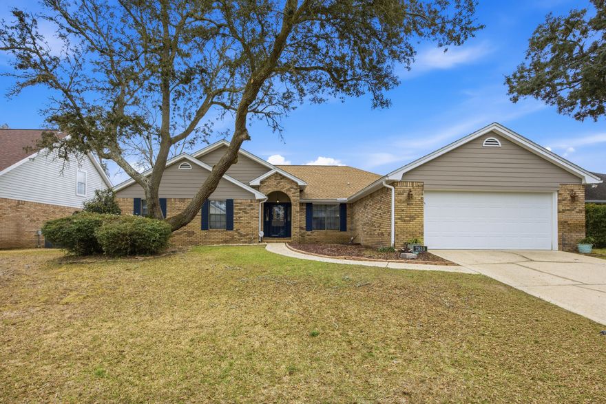 POOL! Experience comfortable Florida living in the highly desirable Lake Lorraine Estates community of Shalimar. With a spacious layout, thoughtful details, and a prime Emerald Coast location, this hHurlburtrs the perfect blend of style, function, and convenience.

Inside, you're welcomed by a tiled foyer that leads to a formal dining room accented with crown molding and chair rail details. The main living room features cathedral ceilings and a cozy wood-burning fireplace, creating an inviting space to relax or entertain. The kitchen offers granite countertops, tile flooring, bar seating, and an eat-in dining area, and opens to a secondary living space that provides additional room for gathering. A laundry room with access to the two-car garage adds everyday convenience.

The split-bedroom floor plan provides privacy, with all bedrooms featuring ceiling fans and carpet flooring. The spacious primary suite showcases vaulted ceilings and direct access to the outdoor living area, while the en-suite bathroom includes tile flooring, a whirlpool tub, separate glass and tile shower, a walk-in closet, and a double vanity with granite countertops.

Step outside to enjoy a covered patio with a ceiling fan and a partially covered deck, perfect for relaxing or entertaining. The privacy-fenced backyard and mature landscaping create a peaceful outdoor retreat.

Conveniently located just minutes from shopping, dining, and retail centers along Eglin Parkway, as well as Uptown Station, this home offers excellent access to everyday conveniences. The property is also approximately half a mile from the beautiful waters of Lake Lorraine and Choctawhatchee Bay, providing easy opportunities to enjoy boating, fishing, and waterfront views. With its close proximity to downtown Fort Walton Beach, Eglin Air Force Base, and Hurlburt Field, this location offers the perfect balance of accessibility, lifestyle, and Emerald Coast living.