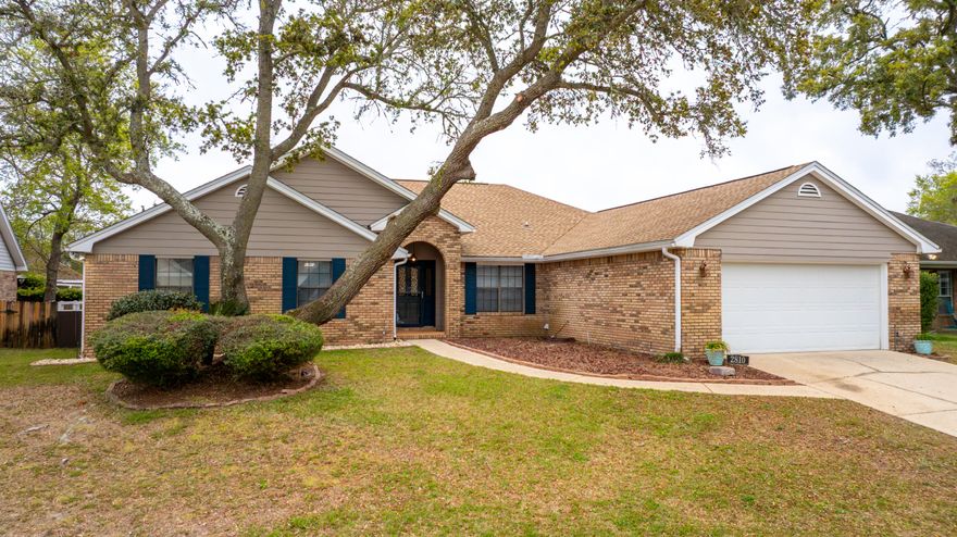 Active Kick-Out - contingent upon buyer sale/closing  POOL! Experience comfortable Florida living in the highly desirable Lake Lorraine Estates community of Shalimar. With a spacious layout, thoughtful details, and a prime Emerald Coast location, this home is the perfect blend of style, function, and convenience. Inside, you're welcomed by a tiled foyer that leads to a formal dining room accented with crown molding and chair rail details. The main living room features cathedral ceilings and a cozy wood-burning fireplace, creating an inviting space to relax or entertain. The kitchen offers granite countertops, tile flooring, bar seating, and an eat-in dining area, and opens to a secondary living space that provides additional room for gathering. A laundry room with access to the two-car garage adds everyday convenience.

The split-bedroom floor plan provides privacy, with all bedrooms featuring ceiling fans and carpet flooring. The spacious primary suite showcases vaulted ceilings and direct access to the outdoor living area, while the en-suite bathroom includes tile flooring, a whirlpool tub, separate glass and tile shower, a walk-in closet, and a double vanity with granite countertops.

Step outside to enjoy a covered patio with a ceiling fan and a partially covered deck, perfect for relaxing or entertaining. The privacy-fenced backyard and mature landscaping create a peaceful outdoor retreat.

Conveniently located just minutes from shopping, dining, and retail centers along Eglin Parkway, as well as Uptown Station, this home offers excellent access to everyday conveniences. The property is also approximately half a mile from the beautiful waters of Lake Lorraine and Choctawhatchee Bay, providing easy opportunities to enjoy boating, fishing, and waterfront views. With its close proximity to downtown Fort Walton Beach, Eglin Air Force Base, and Hurlburt Field, this location offers the perfect balance of accessibility, lifestyle, and Emerald Coast living.