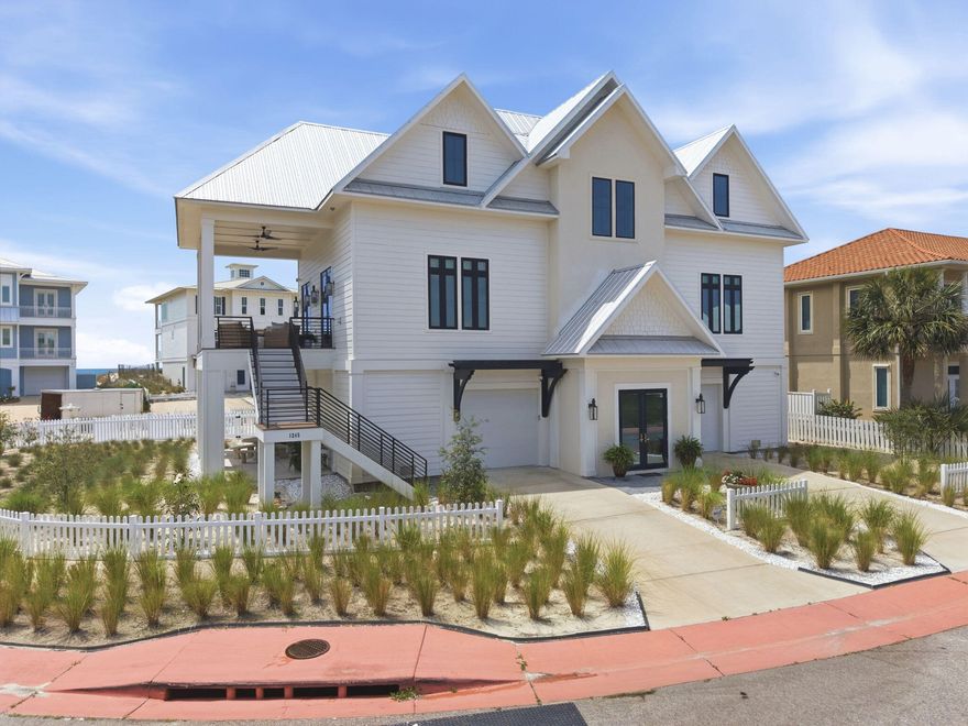 Newly built in 2025, this 4-bedroom, 3.5-bath custom home with elevator offers refined coastal living in the highly desirable Parasol community of Perdido Key. Enjoy stunning views from multiple porches along with approximately 900' of private Gulf-front beach access reserved exclusively for Parasol owners. Designed with exceptional craftsmanship & upscale finishes throughout, this home is the perfect balance of elegance & luxury coastal living. Every inch of this beach home is touched with beauty, and the thoughtfulness in the design stands out. Step inside where the antique pine flooring flows throughout the entire residence, which is complemented by extra touches of crown molding, rounded sheetrock corners, antique wrought iron chandelier & all poplar inset cabinetry with Orleans raised panel doors. The chef's kitchen is truly impressive with a Wolf 48" dual fuel range, Sub-Zero 48" side-by-side refrigerator, KitchenAid undercounter ice maker, Fisher & Paykel double drawer dishwasher, instant hot water dispenser & an oversized 9'x5' cypress island topped with stunning Rhino White Calcite countertops. Additional Rhino White Calcite surfaces continue throughout the baths. Spa-inspired bathrooms feature elegant Thassos marble shower enclosures & tub surrounds along with Kohler fixtures. The spacious primary suite includes a large walk-in closet with custom built-ins. Built for peace of mind, the home also features a metal roof, Trane HVAC system, whole-home 38kW liquid-cooled generator, two Rinnai tankless water heaters, & hardwired Honeywell security system. Additional highlights include Hunter Original ceiling fans, powder-coated interior & exterior railings, gas lanterns on the front & rear porches & an Isokern gas fireplace with gas logs for added charm. Parasol is one of Perdido Key's premier rent-restricted communities, offering privacy, exclusivity & an unmatched coastal lifestyle. Experience coastal living at its finest - Schedule your tour today!