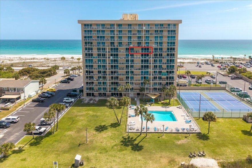 Perched on the eighth floor, this beautifully remodeled condo offers sweeping views of Little Sabine Bay with convenient Gulf beach access just across the street! See the MLS docs for a full list of upgrades. Enjoy the coastal scenery from the expansive 31'10'' x 5' private balcony. Whether you're looking for a primary residence or short-term rental opportunity (rental projections coming in at $41K+), this unit is a showstopper. Inside, the unit showcases a sleek black and white interior with cohesive flooring throughout, crisp white walls, recessed lighting, and striking black accent doors for a clean, modern aesthetic. For added quietness throughout, the doors are solid core doors, while the windows and sliding glass doors are high impact hurricane rated. Other major updates include a 20 water heater and 2026 HVAC. The kitchen features glossy flat-panel cabinetry, tiled black modern backsplash, quartz countertops, stainless steel appliances, and copious storage. The bedroom is generously sized with direct balcony access and two closets equipped with built-ins. The bathroom is equally impressive, offering a quartz topped double vanity, a tiled standing shower, and cleverly designed storage. The community amenities are unmatched for Pensacola Beach, including a pool, boat launch, fitness center, sauna, tennis, pickleball and basketball courts, kayak storage, fishing dock, grill area, and a community room that accommodates up to 50 guests. Additional features include open parking, elevators, trash chutes, a 3x3 private storage area, and on-site management. All of this is just moments from the dining, entertainment, and attractions that make Pensacola Beach so desirable!