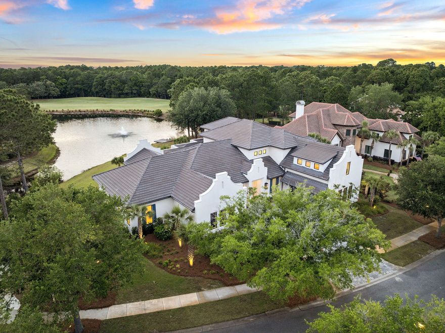 Behind the gates of Burnt Pine at Sandestin, there's a home that stops you cold. You walk through the door and the 14-foot foyer opens up into the main living level, which sets the tone immediately: 12-foot ceilings, Peaky Cypress beams, a Great Room fireplace with Venetian plaster surround, and engineered white oak floors that run throughout the entire home. The chef's kitchen is anchored by a Wolf 48' dual-fuel range, Sub-Zero refrigerator and ice maker, two Bosch dishwashers, and hand-selected Calcite stone countertops -- all framed by custom maple and white oak cabinetry. A fully outfitted butler's pantry with a Fisher & Paykel refrigerator and Bosch built-in oven adds a level of entertaining capability rarely found in this market. The primary suite features all-marble tile, a Victoria & Albert freestanding soaking tub, and a custom 10-foot closet with a dedicated washer/dryer set. Two additional laundry sets are located throughout the home. The outdoor living space is equally exceptional. A screened-in gunite saltwater pool with a flush spa, three deck jets, LED lighting, and a heater is finished with travertine shell stone. Smart home integration all controlled by your phone: Lutron smart lighting, Levolor automated shades, Sonos audio throughout interior and exterior, Ubiquity whole-home WiFi and a Bosch security system. Three Rheem HVAC units and three Navien tankless water heaters ensure comfort and efficiency at scale. 

Set within the gates of Burnt Pine, this home places you inside one of Sandestin's most private enclaves where golf, marina access, private beaches, and resort amenities exist just beyond your door, yet life inside the home remains serene and personal. This is luxury defined not by excess, but by intention, comfort, and the freedom to truly enjoy where you live.