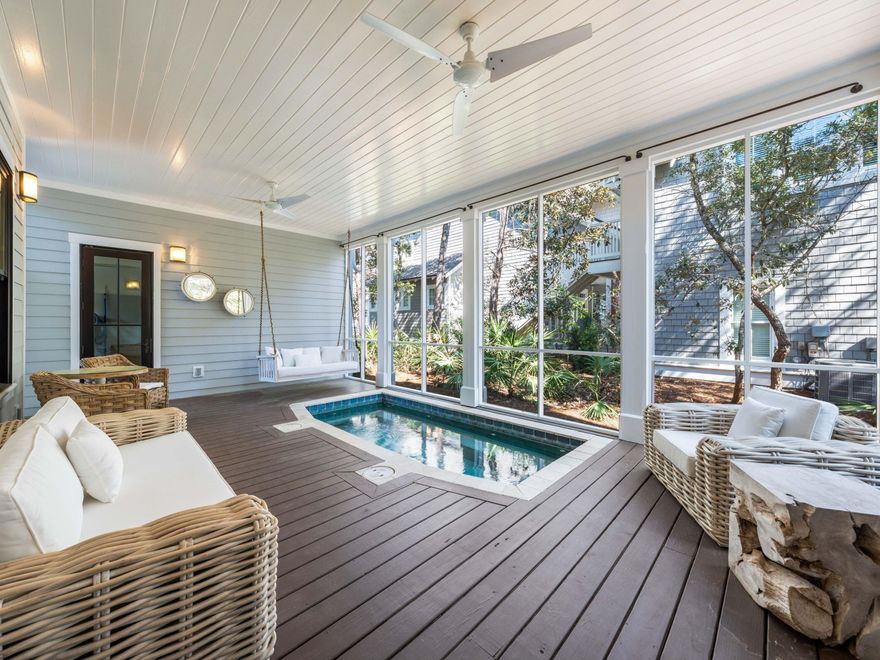 Located along a tranquil street within the exclusive WaterSound Beach community, this furnished residence offers a serene retreat with four bedrooms, four full baths and one powder bath.  An expansive 1,700 square feet of outdoor porches includes a spacious screened porch that features a private 14-foot spa. The sunlit open concept living and dining areas provide ample space for family gatherings, complemented by hardwood floors and intricate board and batten wall details.

The kitchen is a culinary haven, featuring a spacious center island adorned with marble countertops, custom cabinetry, and  stainless appliances, including a wine refrigerator. A comfortable guest suite with ensuite and powder bath are conveniently located on the first level. Ascend to the upper level to discover a spacious secondary living area complete with four built-in bunks. The master suite exudes opulence, characterized by a vaulted tongue and groove ceiling, a wraparound balcony, and an ensuite bath.

The second floor further enhances the property with an additional guest suite with ensuite and laundry. A spacious carriage house provides a welcoming space for guests, situated above the garage that accommodates one car and a golf cart. Recent enhancements include updated decorative lighting, furnishings, exterior painting, and enhanced landscaping.

The gated WaterSound Beach community, strategically located south of Scenic Highway 30A, offers homeowners a rare sense of seclusion while providing convenient access to a variety of recreational activities. Amenities include swimming pools, multiple parks, green spaces, a state-of-the-art fitness center, and private boardwalks leading to one of the most picturesque mile stretches of coastline in the region.