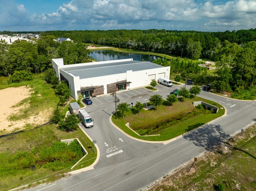 Extraordinary 14,000+ Square Foot Warehouse, Showroom, and Office in the heart of Santa Rosa Beach, Florida! Zoned Village Mixed Use according to the Walton County FLUM.