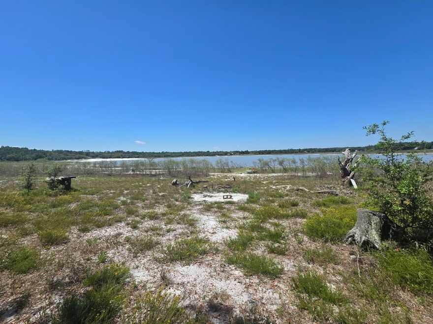 Seller offering $7,000 toward buyer closing costs and $10,000 toward repairs with acceptable full price offer -- USDA eligible area. Can Buy as is for $185,900 ....
Fantastic deal on Boat Lake in the Sunny Hills community. This 2 bedroom, 2 Bathroom, 1,333 sq ft Handyman Special features 2018 HVAC, a metal roof, and sits directly on Boat Lake, offering unobstructed views of one of the Panhandle's most beautiful spring-fed lakes.This property is ideal for buyers seeking affordable lakefront living, investors looking for a value-add renovation, or anyone wanting a peaceful waterfront home with massive upside potential.

Wake up each morning to a BEAUTIFUL VIEW OF BOAT LAKE, known for its white-sand shoreline, crystal-clear water, and natural sandy bottom. Your backyard becomes a private gateway to fishing, swimming, kayaking, and enjoying Florida's natural beauty right from your own shoreline.

🌊 Waterfront Features
Waterfront Type: Lakefront

Waterfront Feature: Shore - Natural

Waterview: Lake; Unobstructed

🏖️ About Boat Lake
Boat Lake is the #1 attraction in Sunny Hills -- a 44-acre spring-fed lake with a white-sand beach, clear water, and a family-friendly swim park.

White-sand beach

Clear water swimming area

Picnic areas

Seasonal community events

Highly rated: 4.6 stars (88 reviews)

Loved for its clean water and peaceful setting

🌴 Community Highlights
Sunny Hills offers:

Low taxes

No mandated HOA

Multiple lakes and recreation areas

Quiet, natural surroundin