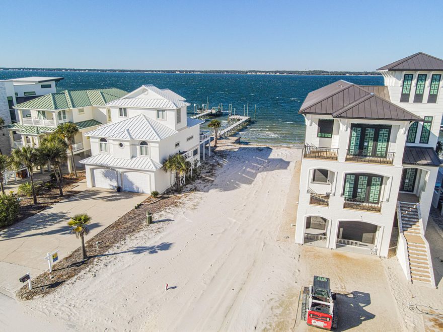 We have a survey!
Imagine sipping your morning coffee while gazing out at the tranquil waters, or hosting friends and family for evening gatherings with the sunset as your backdrop. You can even enhance your luxury by adding a private dock, giving you seamless access to a world of water adventures, be it kayaking, paddleboarding, or fishing in the pristine blue waters. Navarre Beach is more than just a picturesque setting. It offers easy public access to the Gulf of America just 0.2 miles away, allowing for spontaneous beach days filled with sunbathing, swimming, and beachcombing along the sparkling shoreline. For those who love to fish or simply enjoy a day by the water, the iconic Navarre fishing pier is only 3.3 miles from your future doorstep. This local gem has a vibrant history and is surrounded by charming restaurants that serve fresh, delicious seafood, perfect for unwinding after a day of exploration. Make an offer today!