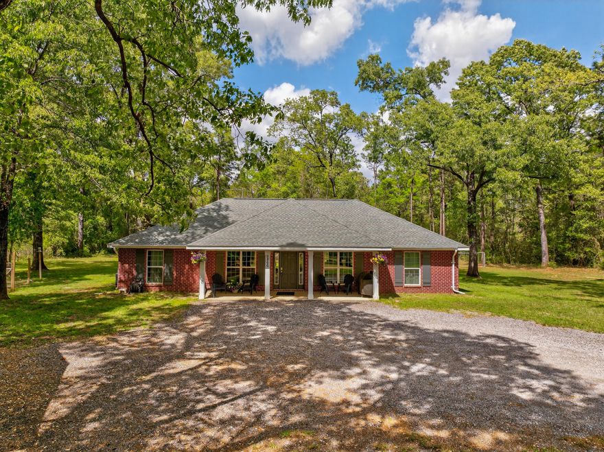 3.5 ACRES, BUILT IN 2022, FRUIT TREES,  LAWN IRRIGATION, 1/2 Mile to Juniper Creek, Across the street from beautiful walking trails!  Enjoy country living on this rural agricultural property featuring a 4-bedroom, 2-bath home with a welcoming covered porch. The property includes a detached garage, firepit, private well, and irrigation system. The land offers established blueberry and blackberry bushes, one pear tree, three peach trees, fig and mulberry bushes, and a wild persimmon tree. The home is nearby Juniper Creek Trail and Juniper Creek for outdoor recreation such as hiking, swimming and fishing. A chicken coop and rabbit hutch are included. Offering space, privacy, and flexibility for a variety of uses.