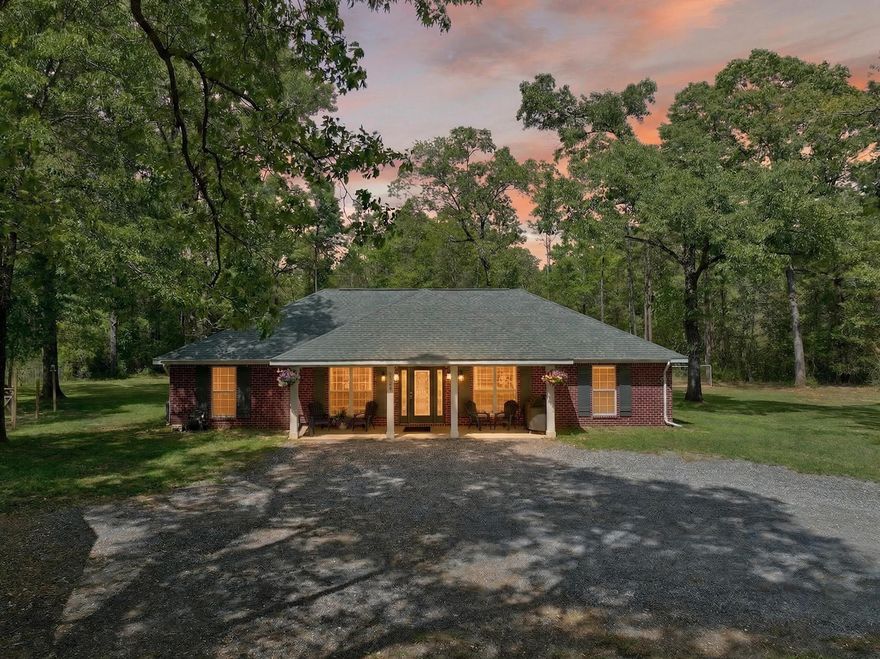 3.5 ACRES, BUILT IN 2022, FRUIT TREES,  LAWN IRRIGATION, 1/2 Mile to Juniper Creek, Across the street from beautiful walking trails!  Enjoy country living on this rural agricultural property featuring a 4-bedroom, 2-bath home with a welcoming covered porch. The property includes a detached garage, firepit, private well, and irrigation system. The land offers established blueberry and blackberry bushes, one pear tree, three peach trees, fig and mulberry bushes, and a wild persimmon tree. The home is nearby Juniper Creek Trail and Juniper Creek for outdoor recreation such as hiking, swimming and fishing. A chicken coop and rabbit hutch are included. Offering space, privacy, and flexibility for a variety of uses.