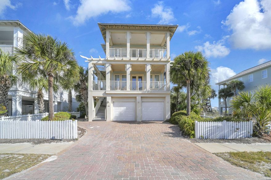 Located in the serene Holiday Isle neighborhood of Destin Pointe, 64 Lands End Drive is a distinguished residence offering both luxury and comfort. This 3-bedroom, 3 full bathrooms plus 2 half baths spans just over 3,000 square feet across 3 levels which is easily accessible via elevator. This property boasts a spacious layout designed for both relaxation and entertainment. The main living areas feature two inviting great rooms, each equipped with cozy fireplaces, providing warmth and ambiance in addition to expansive porches that showcase views of Lake Christina, Destin Pass/bridge, and the Gulf! The master suite serves as a private retreat, featuring a comfortable sitting area and a deluxe master bath. Just beyond the garage space on the first level, you will find a washer/dryer, toilet, and sink making for a very easy clean up when coming inside from outdoor activities! A massive sand pit/play area sits next to the grill, this will give the children great entertainment while the cooking is underway. Situated just steps away from the beach and the brand new elevated community pool overlooking the Gulf, you do not want to miss this home! Despite its tranquil setting, the property remains conveniently close to local amenities, ensuring a balanced lifestyle! Additional amenities behind gated Destin Pointe are two lighted tennis courts, shuffleboard, and walking paths. For those seeking a luxurious piece of real estate in Destin, 64 Lands End Drive presents an exceptional opportunity.
