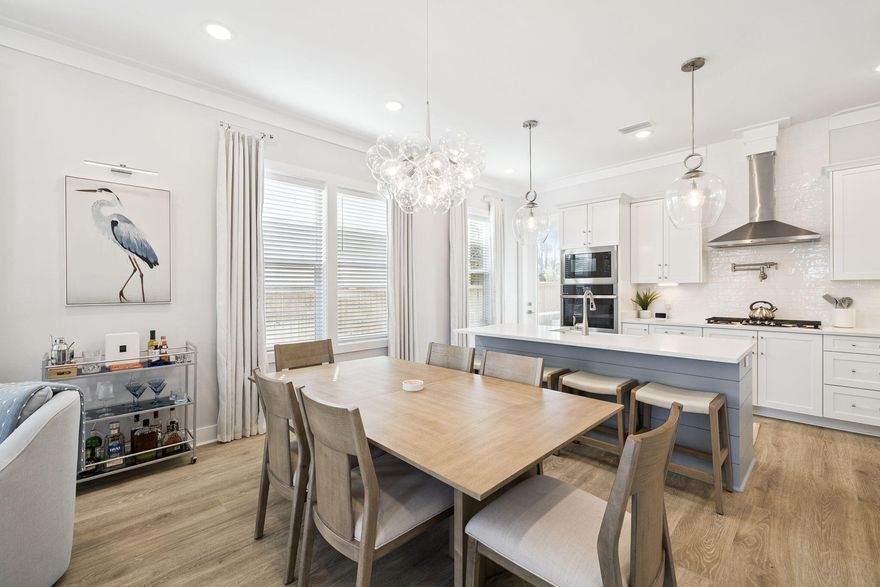 If you've been waiting for a home in Inlet Beach that offers space, flexibility, and a highly walkable location near 30A, 95 W Willow Mist checks all the boxes. With a rarely available floor plan, multiple living areas, and thoughtful upgrades throughout, this is the kind of property that stands out the moment you walk through the door.

Featuring 5 bedrooms, 3.5 bathrooms, and a second-floor bonus loft, the layout is designed to comfortably accommodate both everyday living and hosting guests. The first-floor primary suite provides privacy and convenience, complete with a large walk-in closet and a well-appointed bathroom.

The main living space is open and inviting, highlighted by crown molding, updated light fixtures, and clean coastal finishes. The kitchen is both functional and refined, offering quartz countertops, a gas range with vent hood, stainless steel appliances, a porcelain sink, and updated cabinet hardware, all seamlessly connected to the living and dining areas.

Outdoor living is a true highlight, with both front and rear covered porches featuring wood accent ceilings, along with a screened-in back porch that overlooks a beautifully landscaped backyard. Updated pavers, lush landscaping, irrigation, and an outdoor shower create a space designed to enjoy the coastal lifestyle year-round.

Additional features include a one-car garage with tall ceilings for extra storage, gas tankless water heater, dedicated laundry room, tiled bathrooms, Hardie board exterior, and a security system. The home has been freshly painted throughout and meticulously maintained, offering a move-in ready opportunity.

Located in a highly desirable and walkable community, residents enjoy access to a community pool and a dock on Lake Powell. Just minutes from 30Avenue, with easy access to the pedestrian underpass leading to Alys Beach and Rosemary Beach, and a large regional beach access at the end of the street, this location makes it easy to enjoy everything the 30A lifestyle has to offer.

Whether you're searching for a primary residence, second home, or a short-term rental investment opportunity along 30A, this property offers the flexibility and location to support a wide range of ownership goals.