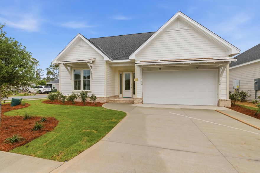 Welcome to the Colt XL, located in the Longleaf Park neighborhood of Watersound Origins with an estimated completion at the end of June 2026. 

This single-level home offers approximately 1,940 square feet of living space, with 3 bedrooms, 2 full baths, and a 2-car garage. The XL version features an expanded living room and dining area, providing additional space for everyday living and entertaining.

The kitchen includes a quartz countertops, 10 ft island with extra storage cabinets under the overhang, upgraded stainless steel Bosch appliance package with gas range, soft-close cabinetry, and a tile backsplash, and opens directly to the larger living and dining areas. The main living spaces feature 10-foot ceilings, crown molding, and luxury vinyl plank flooring. The Owner's Suite includes a custom walk-in closet and private bath with a tiled shower and quartz vanity. Two additional bedrooms and a full bath offer flexibility for guests or a home office.

A screened rear porch extends the living space outdoors. Additional features include energy-efficient construction, professional landscaping with irrigation, and a 2-car garage.

Located within Watersound Origins, residents have access to the Origins Golf Course, Village Commons pool, fitness center, sports courts, trails, and Watersound Town Center, all within the community.